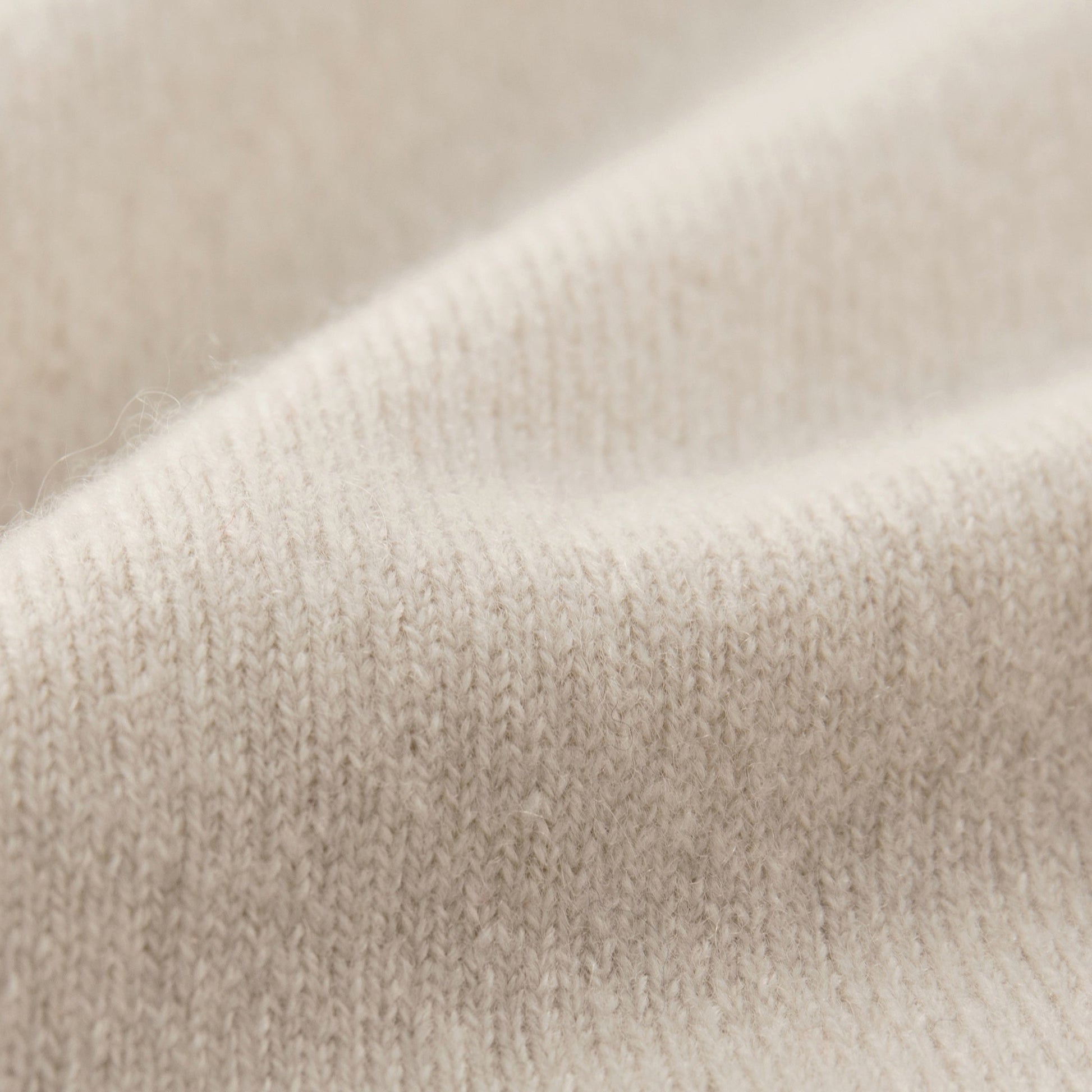 MA04 Short Sleeve Cashmere Tee with Pocket by Mawei, off white, fabric texture close up.