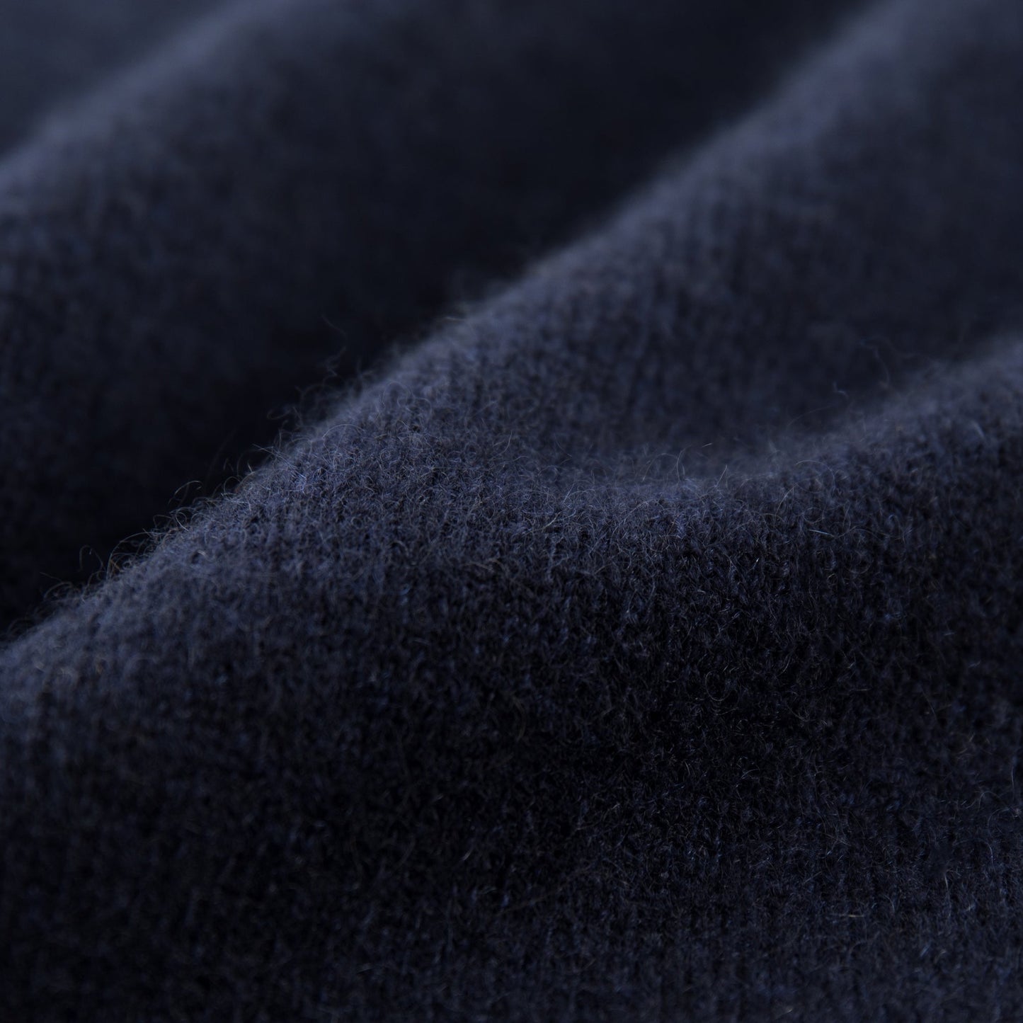 MA04 Short Sleeve Cashmere Tee with Pocket by Mawei, navy blue, fabric texture close up.