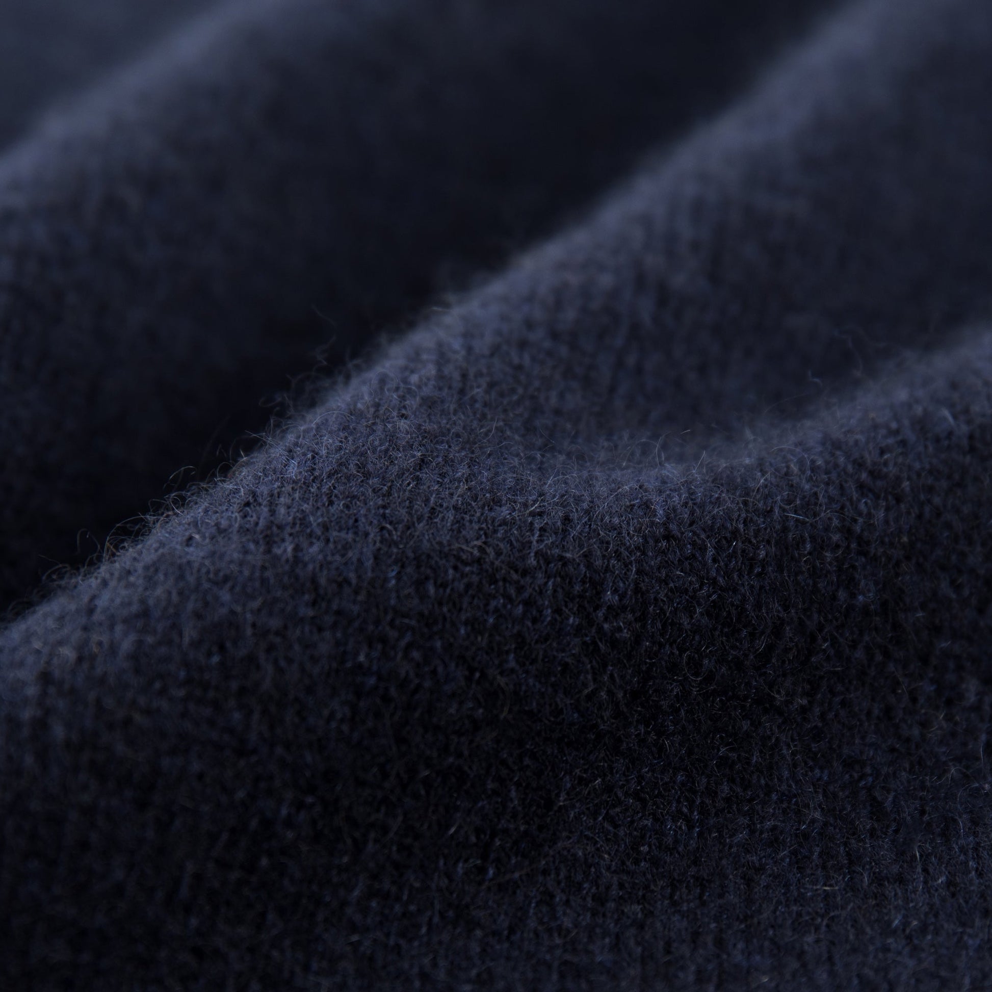 MA04 Short Sleeve Cashmere Tee with Pocket by Mawei, navy blue, fabric texture close up.