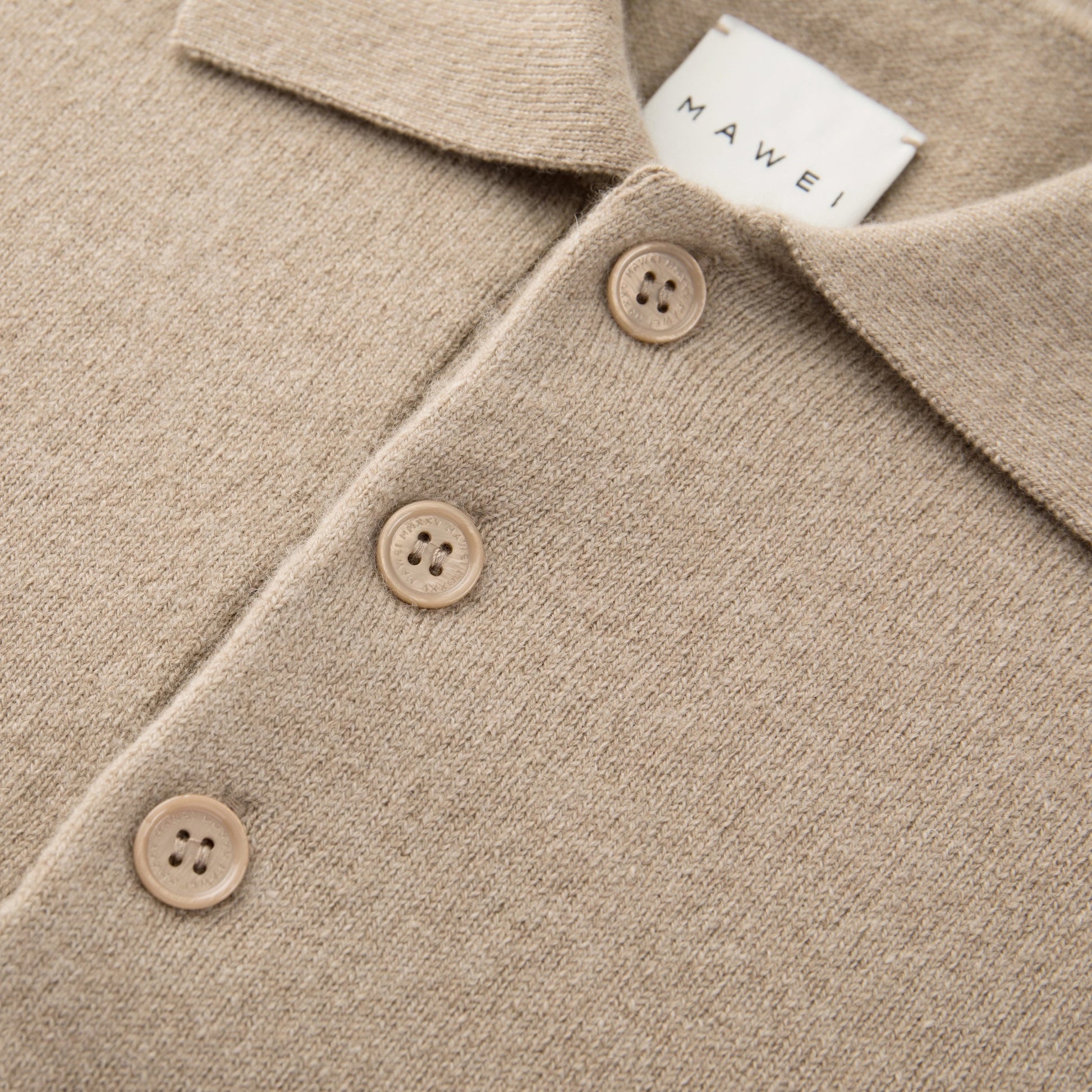 MA25 Cashmere Polo Sweater by Mawei, beige camel, collor buttons close up, front view