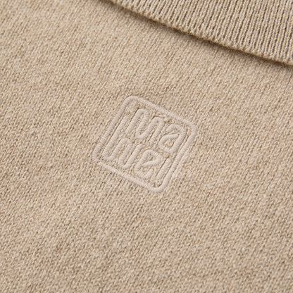 MA25 Cashmere Polo Sweater by Mawei, beige camel, fabric and logo embroidery close up, back view