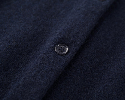 MA06 Cashmere Cardigan by Mawei, navy blue, fabric texture and button details close-up.