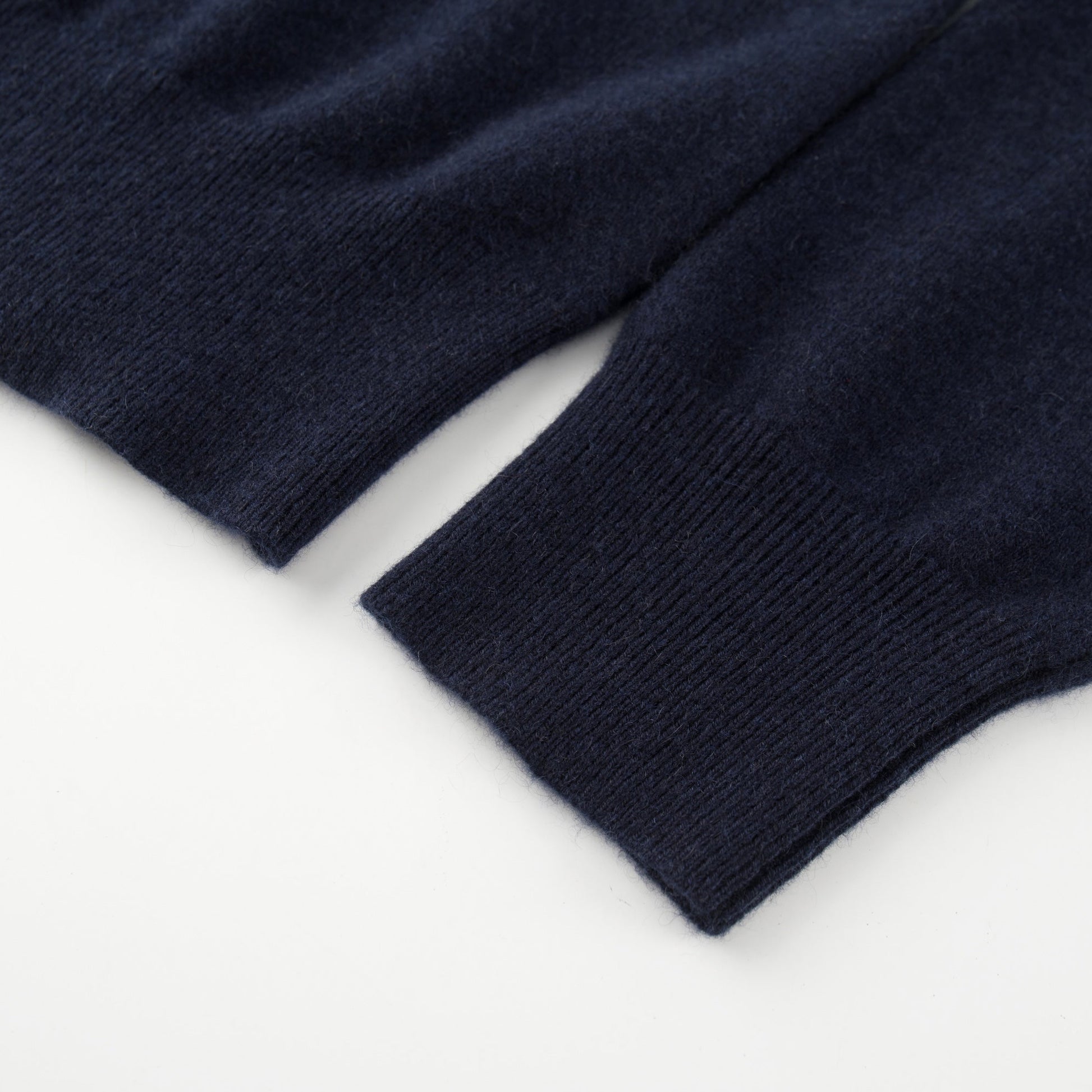 MA06 Cashmere Cardigan by Mawei, navy blue, cuff and hem rib close-up.