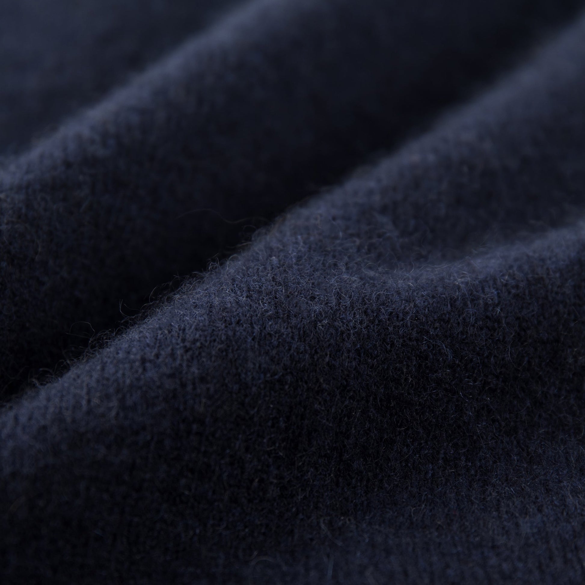 MA06 Cashmere Cardigan by Mawei, navy blue, fabric texture close-up.