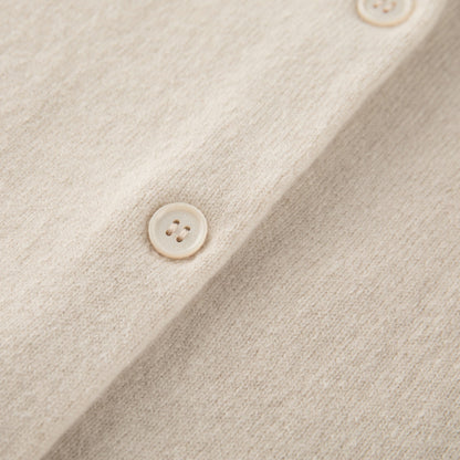 MA06 Cashmere Crewneck Cardigan by Mawei, off white, buttons detail close-up.