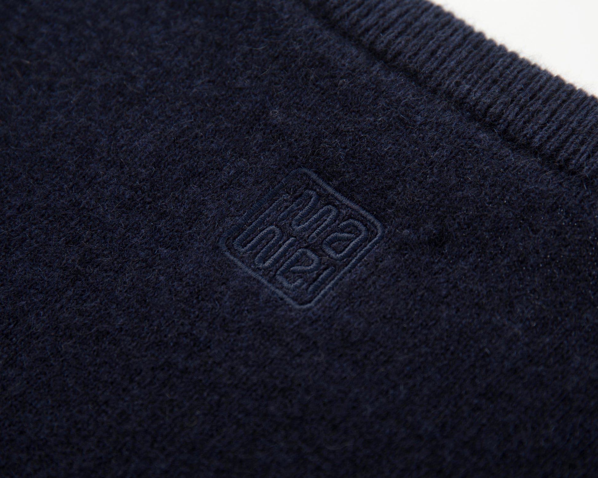 MA07 Short Sleeve Oversized Cashmere  Crewneck  Sweater by Mawei, navy, blue,  embroidery close up, back view.