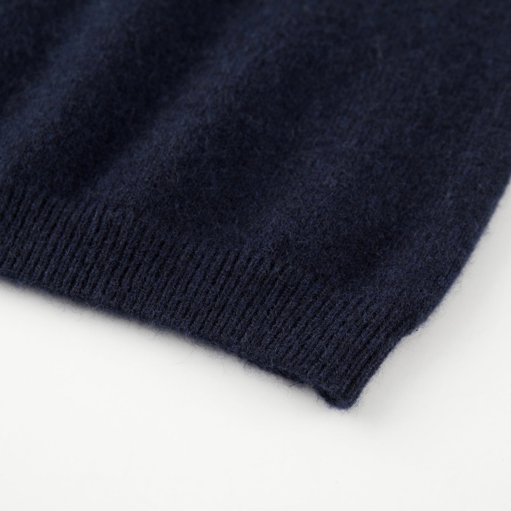 MA07 Cashmere Short Sleeve Crewneck  Sweater by Mawei, navy blue, hem rib close-up.