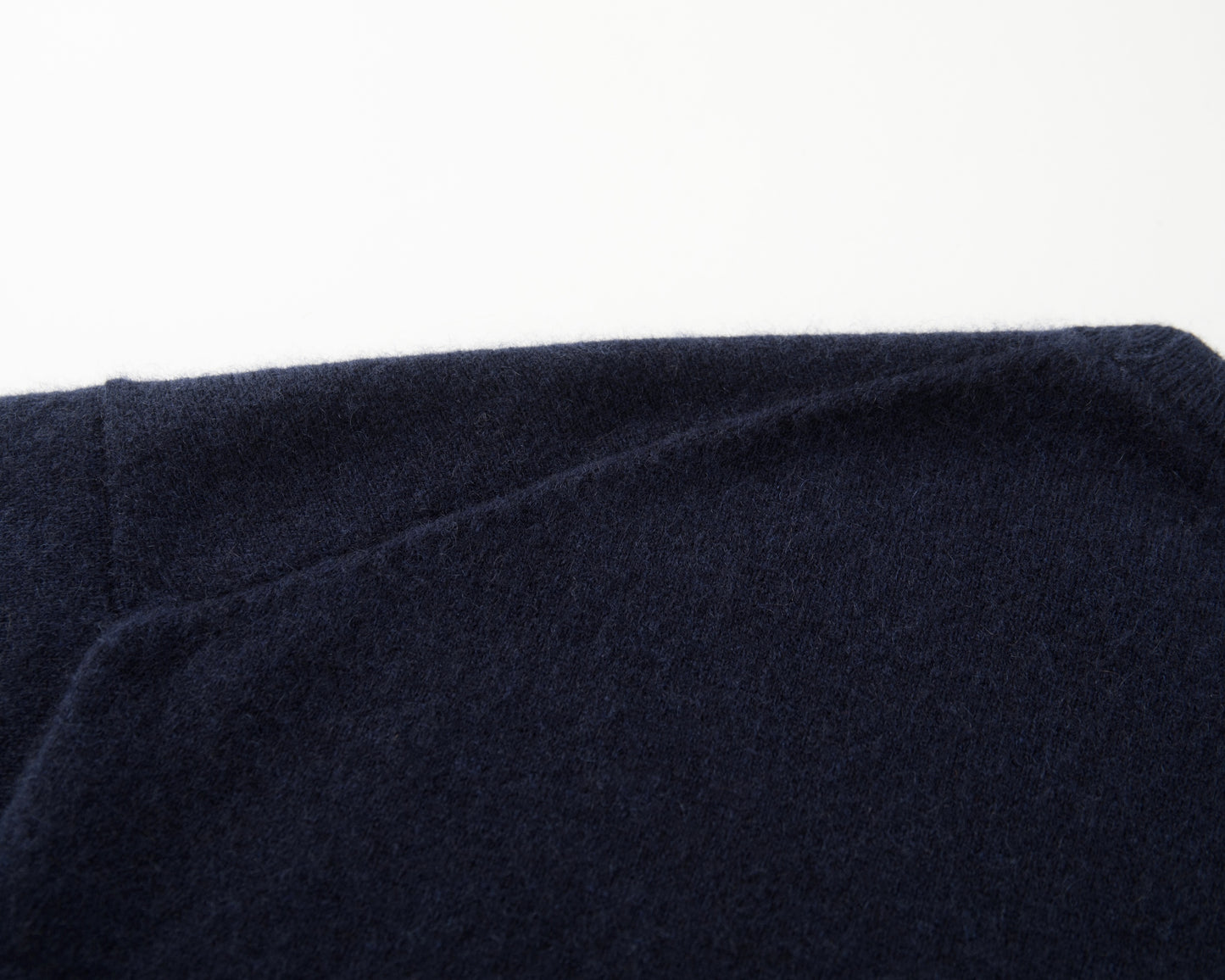 MA07 Short Sleeve Oversized Cashmere  Crewneck  Sweater by Mawei, navy,  blue, knitting details close up, back view.