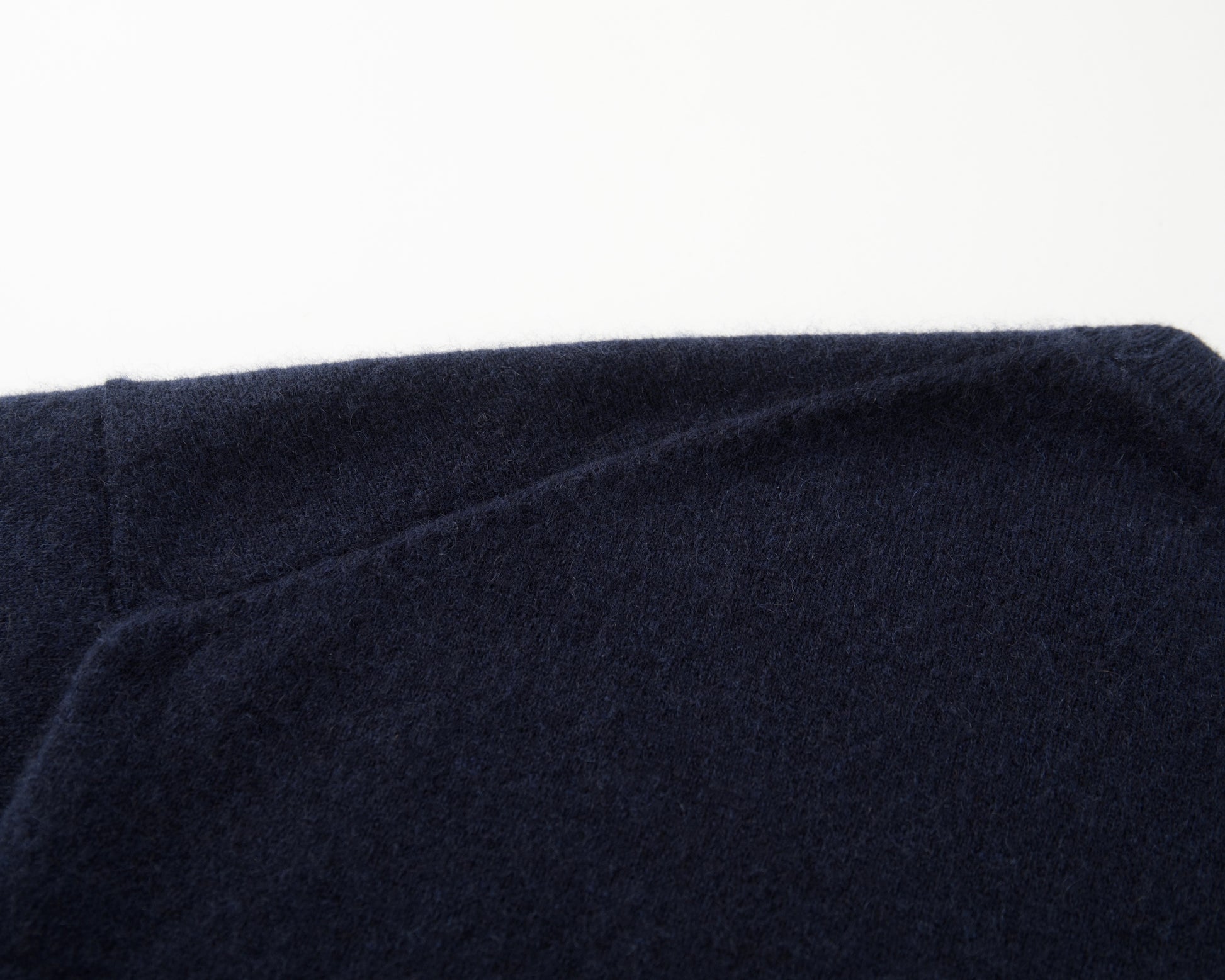 MA07 Short Sleeve Oversized Cashmere  Crewneck  Sweater by Mawei, navy,  blue, knitting details close up, back view.