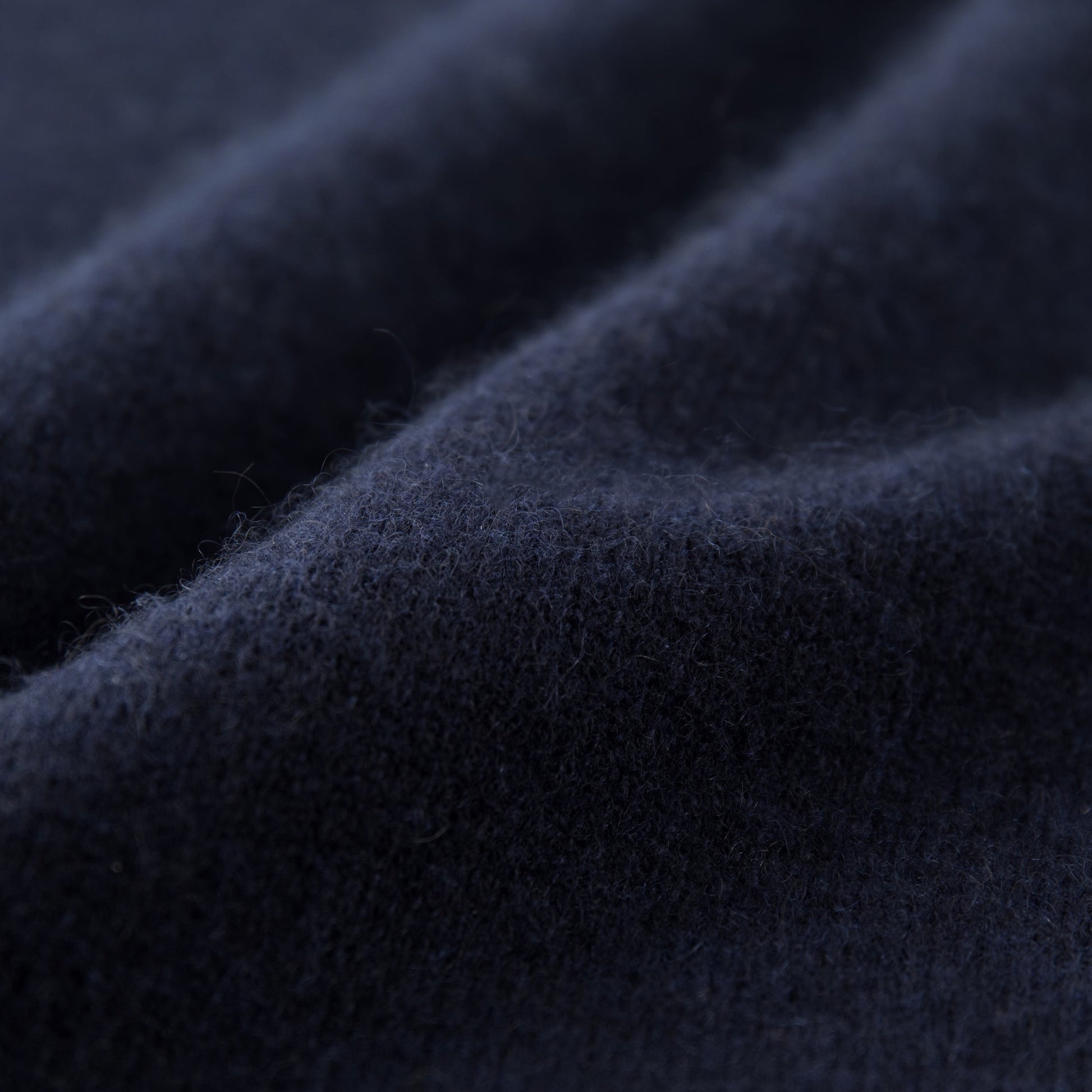 MA07  Cashmere Short Sleeve Crewneck Sweater by Mawei by Mawei, navy blue, fabric texture close-up.
