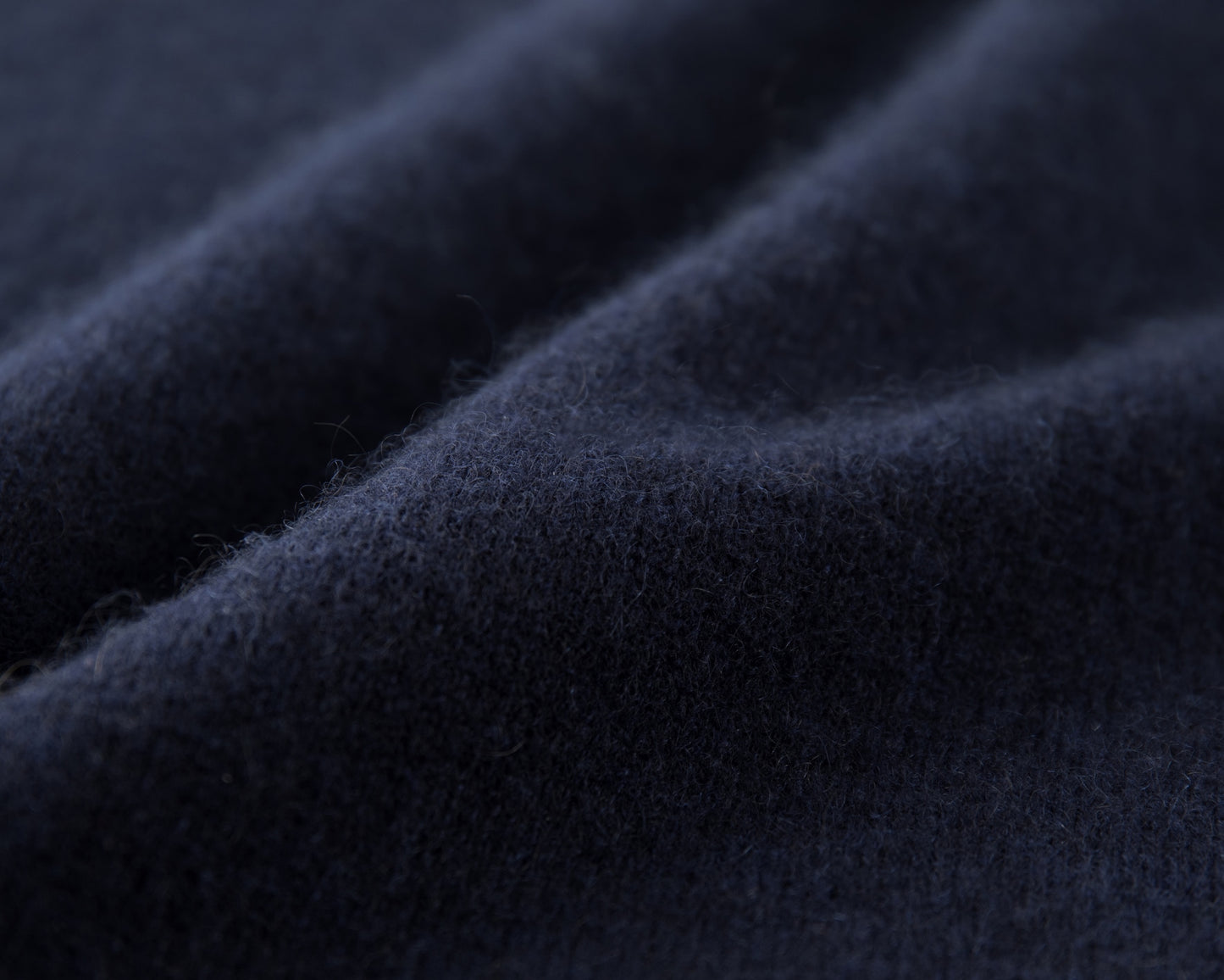MA07 Short Sleeve Oversized Cashmere  Crewneck  Sweater by Mawei, navy,  blue, fabric texture close up.