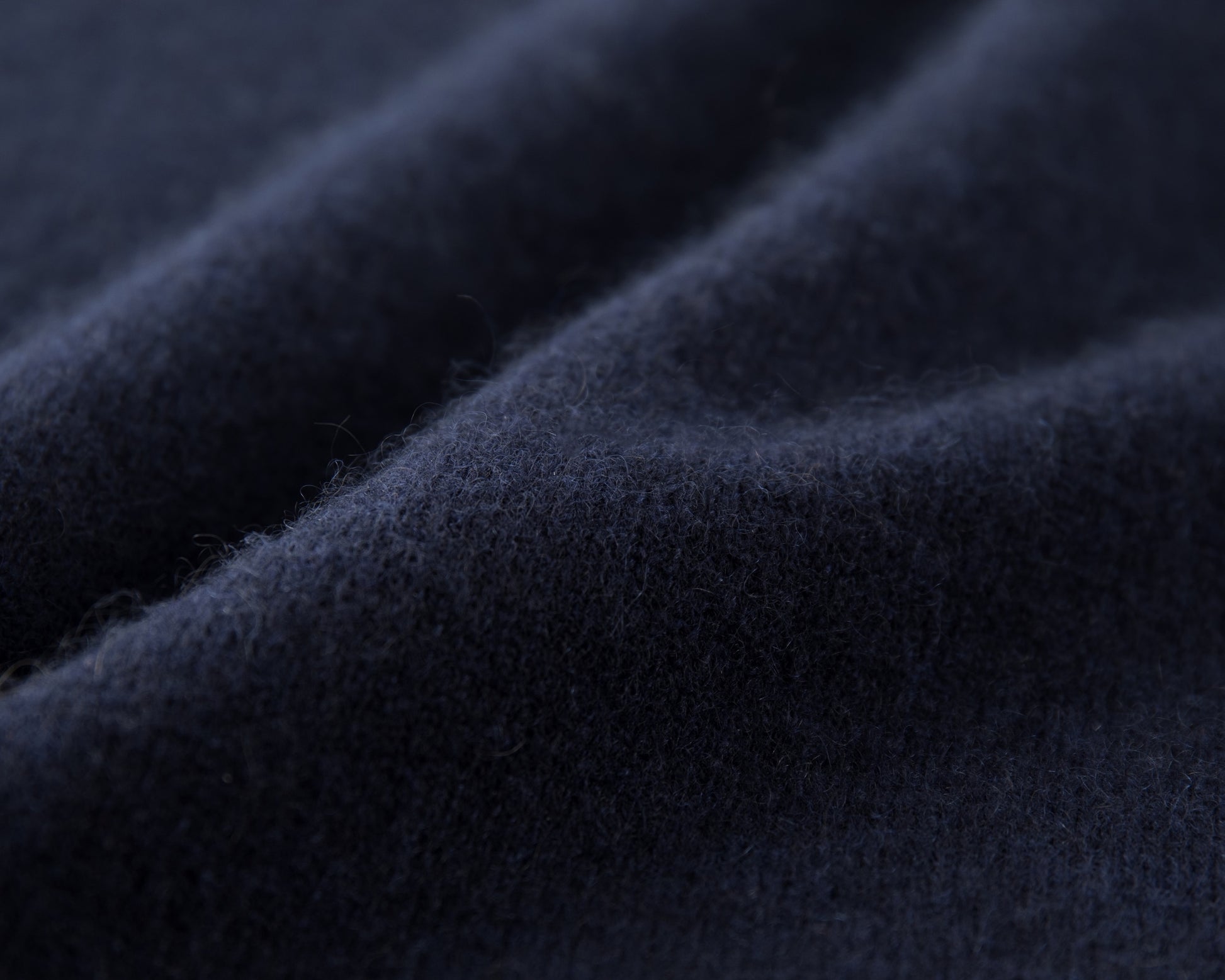 MA07 Short Sleeve Oversized Cashmere  Crewneck  Sweater by Mawei, navy,  blue, fabric texture close up.