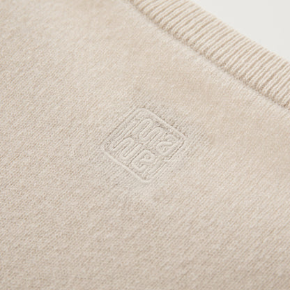 MA07  Cashmere Short Sleeve Crewneck  Sweater by Mawei, off white, fabric and logo embroidery  close-up, back view.