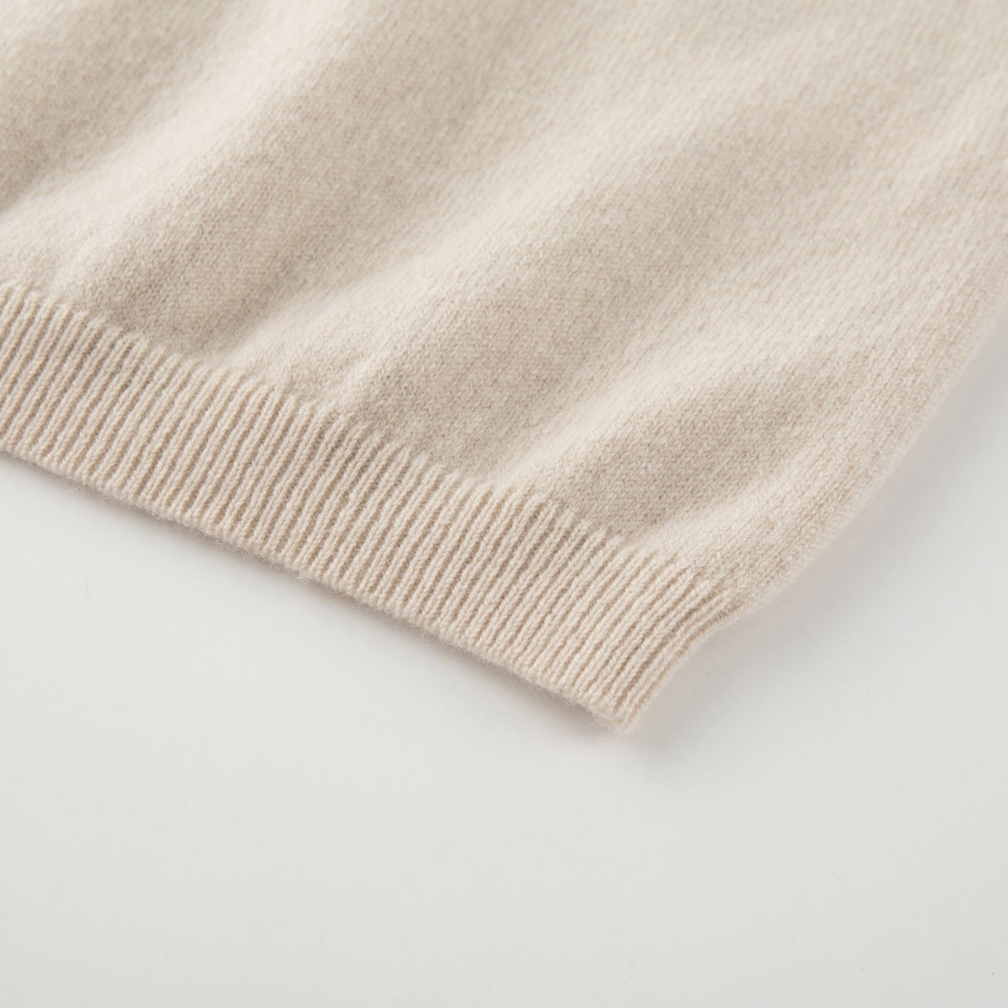 MA07 Cashmere Short Sleeve Crewneck  Sweater by Mawei, off white, hem rib close-up.