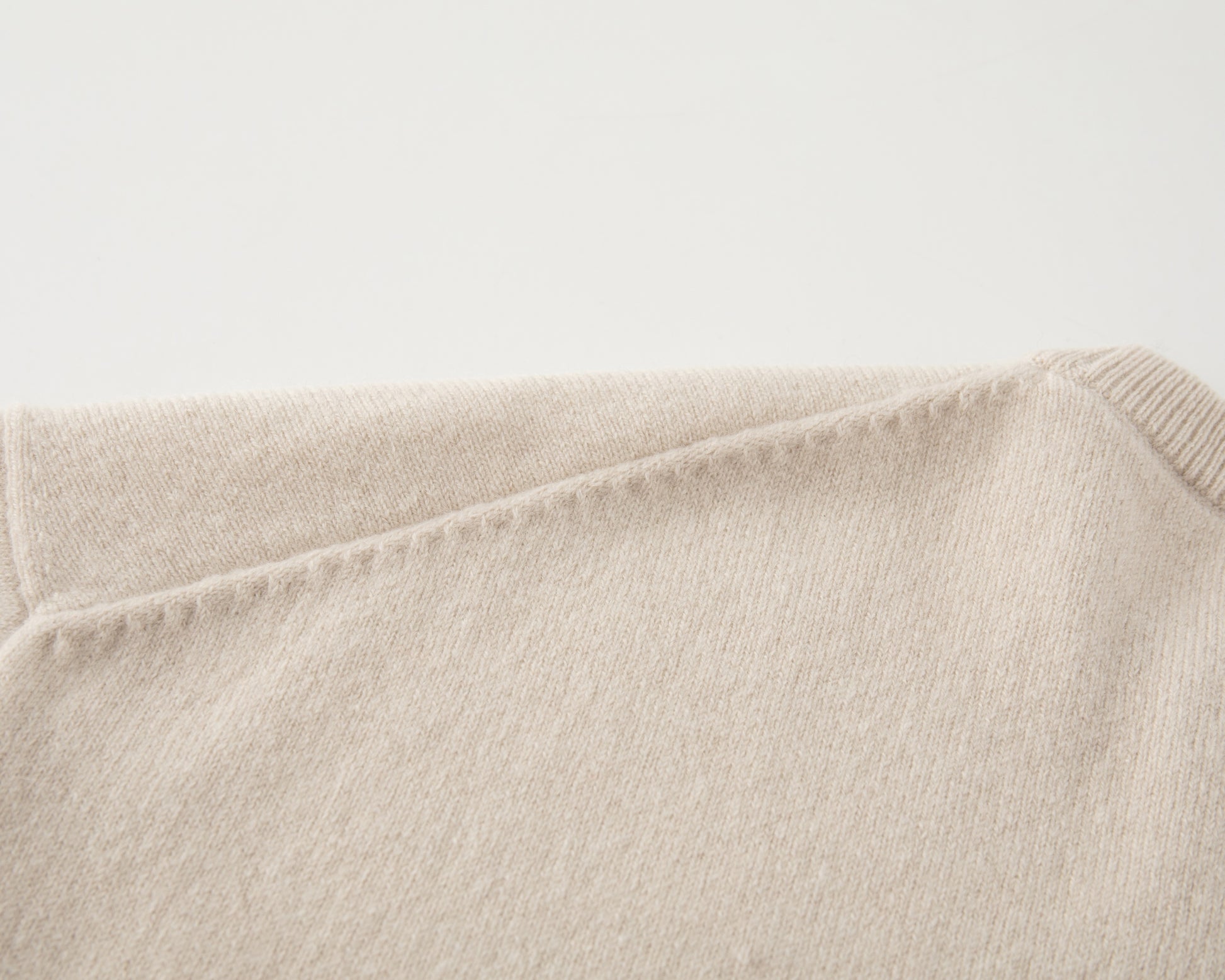 MA07 Short Sleeve Oversized Cashmere  Crewneck  Sweater by Mawei, off-white,  knitting details close up, back view.