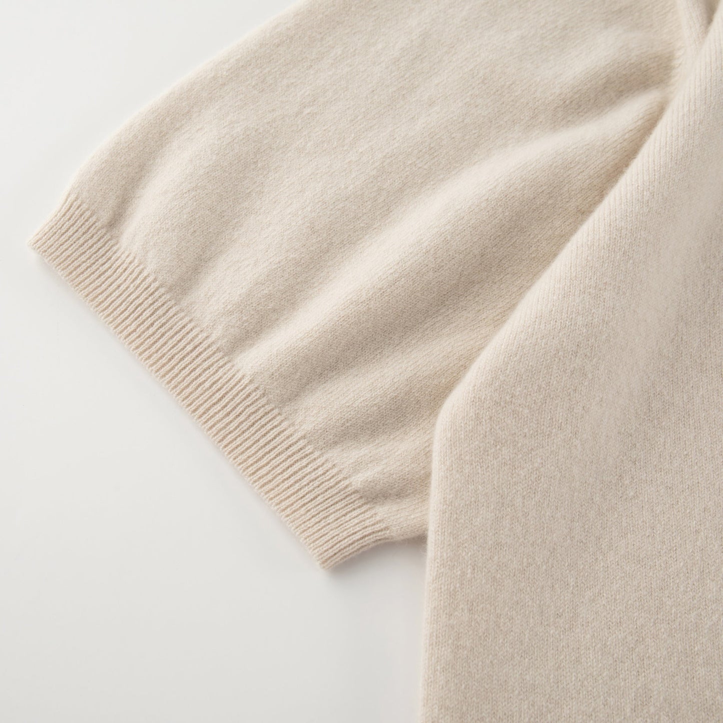 MA07 Cashmere Short Sleeve Crewneck Sweater by Mawei, off white, sleeve and cuff rid details