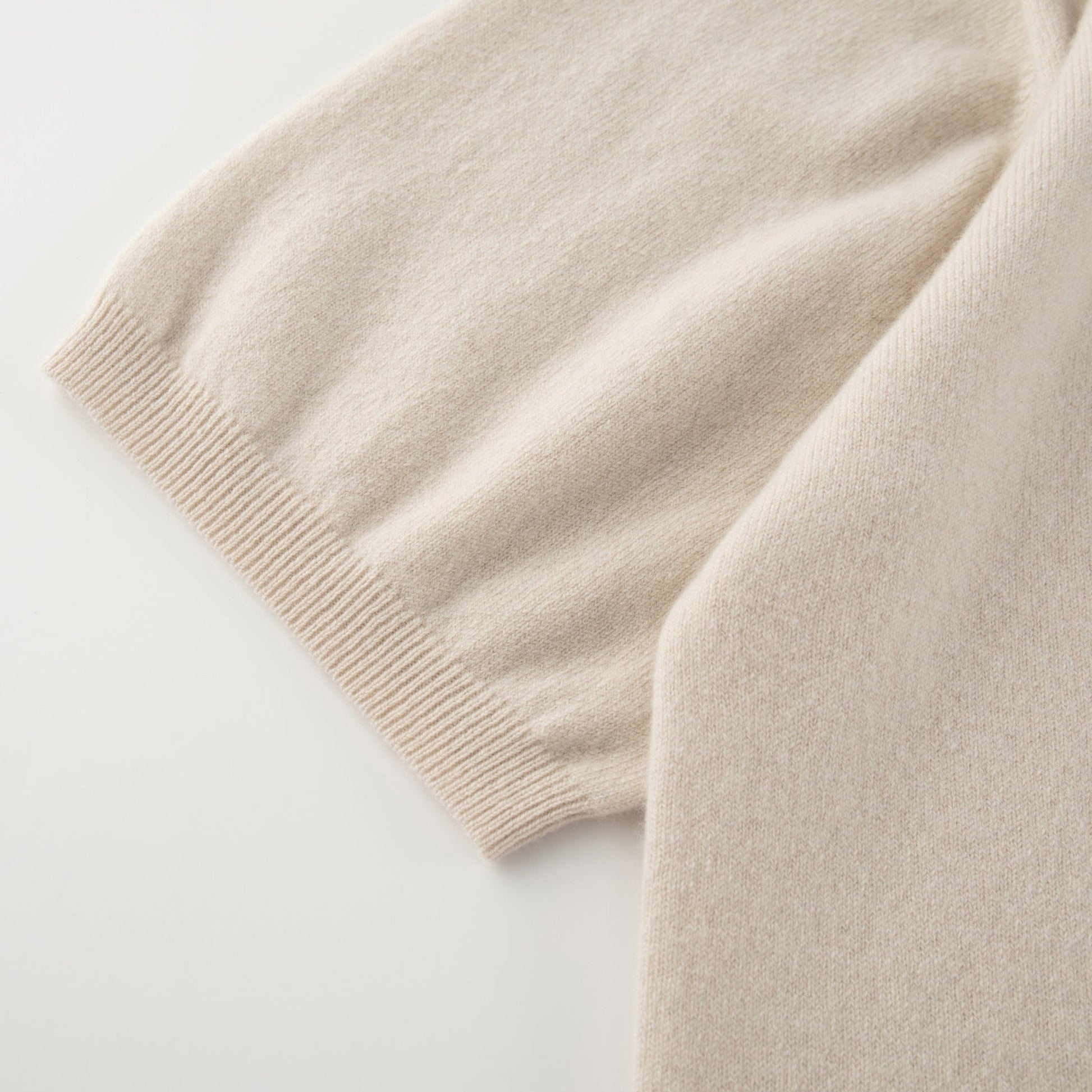 MA07 Cashmere Short Sleeve Crewneck Sweater by Mawei, off white, sleeve and cuff rid details