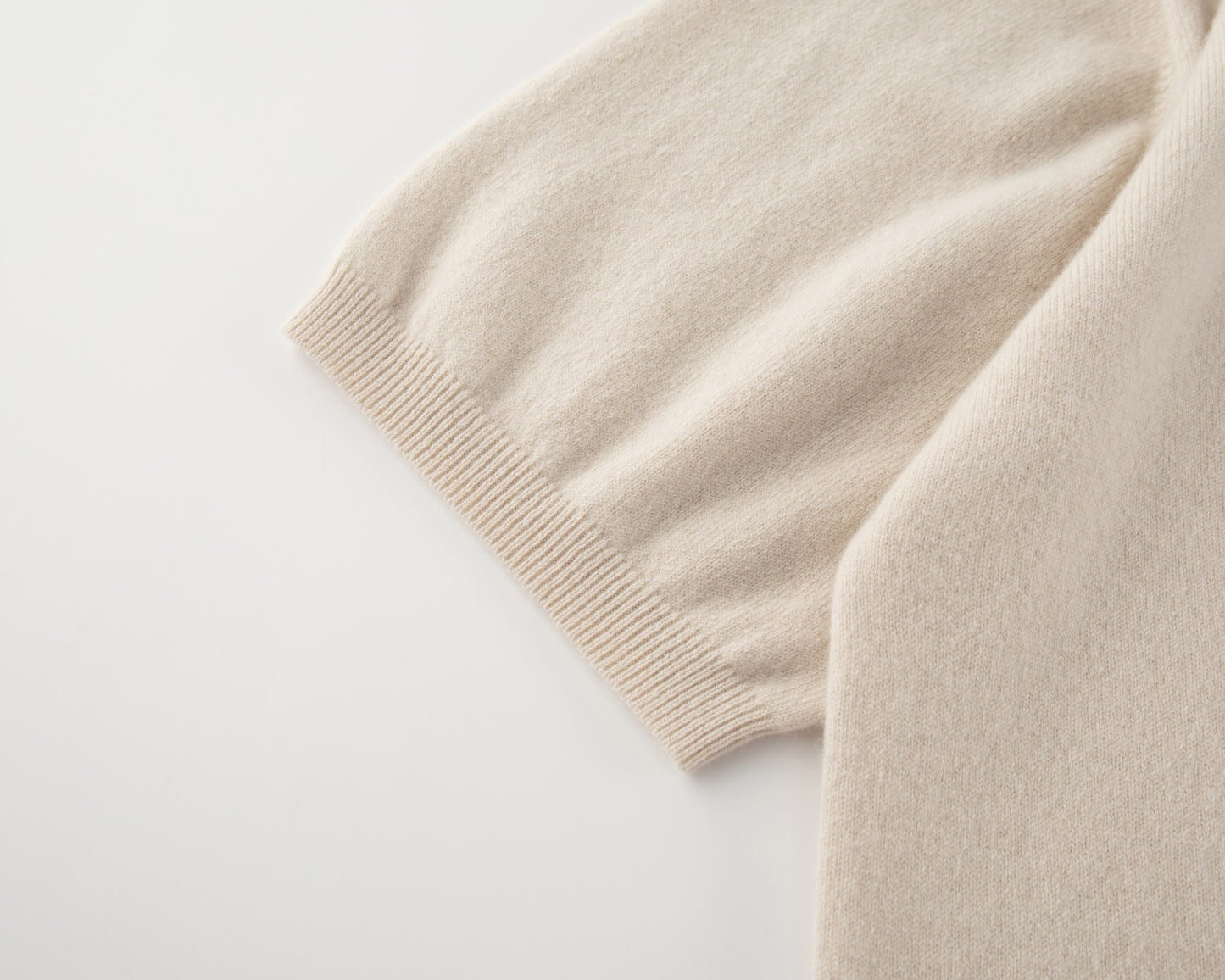 MA07 Short Sleeve Oversized Cashmere  Crewneck  Sweater by Mawei, offwhite,  sleeve, ribbed cuff, knitting details close up