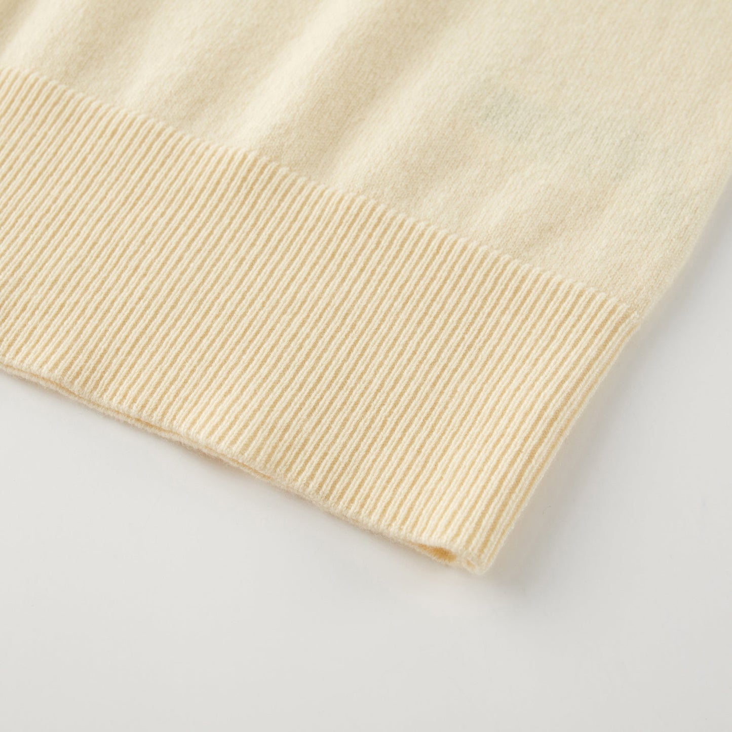 MA08 Oversized Cashmere  V-neck  Sweater by Mawei, yellow, hem rib details close up