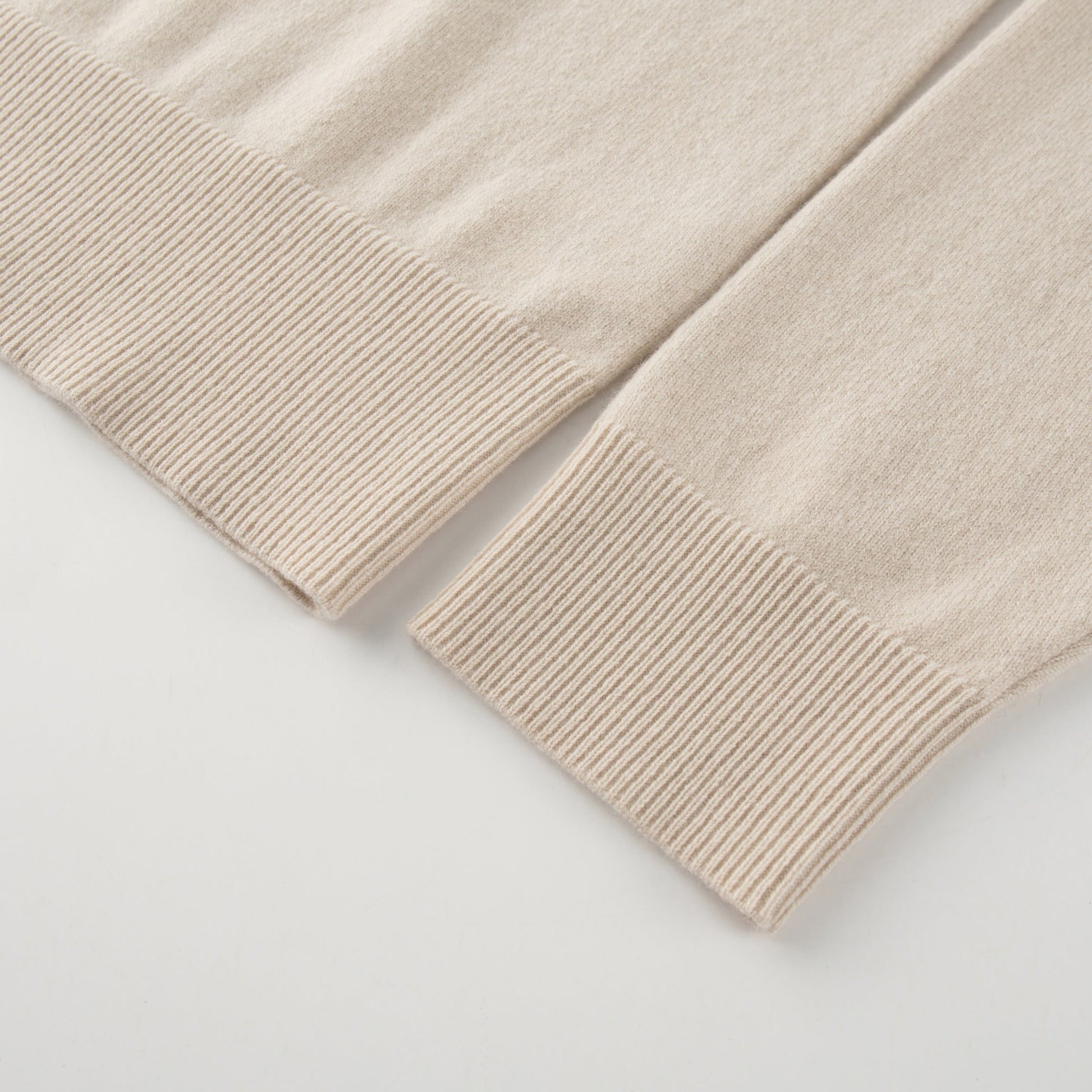 MA08 Oversized Cashmere  V-neck  Sweater by Mawei, off white, cuff and hem details close up