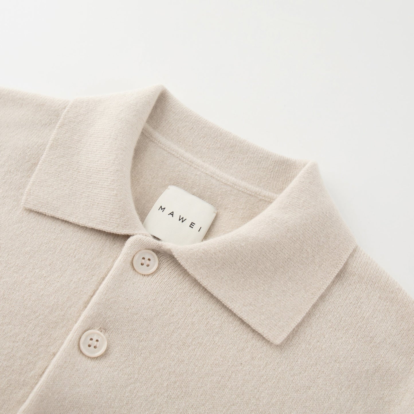 MA09 Cashmere Short Sleeve Polo Sweater by Mawei, off white, collar, buttons close up