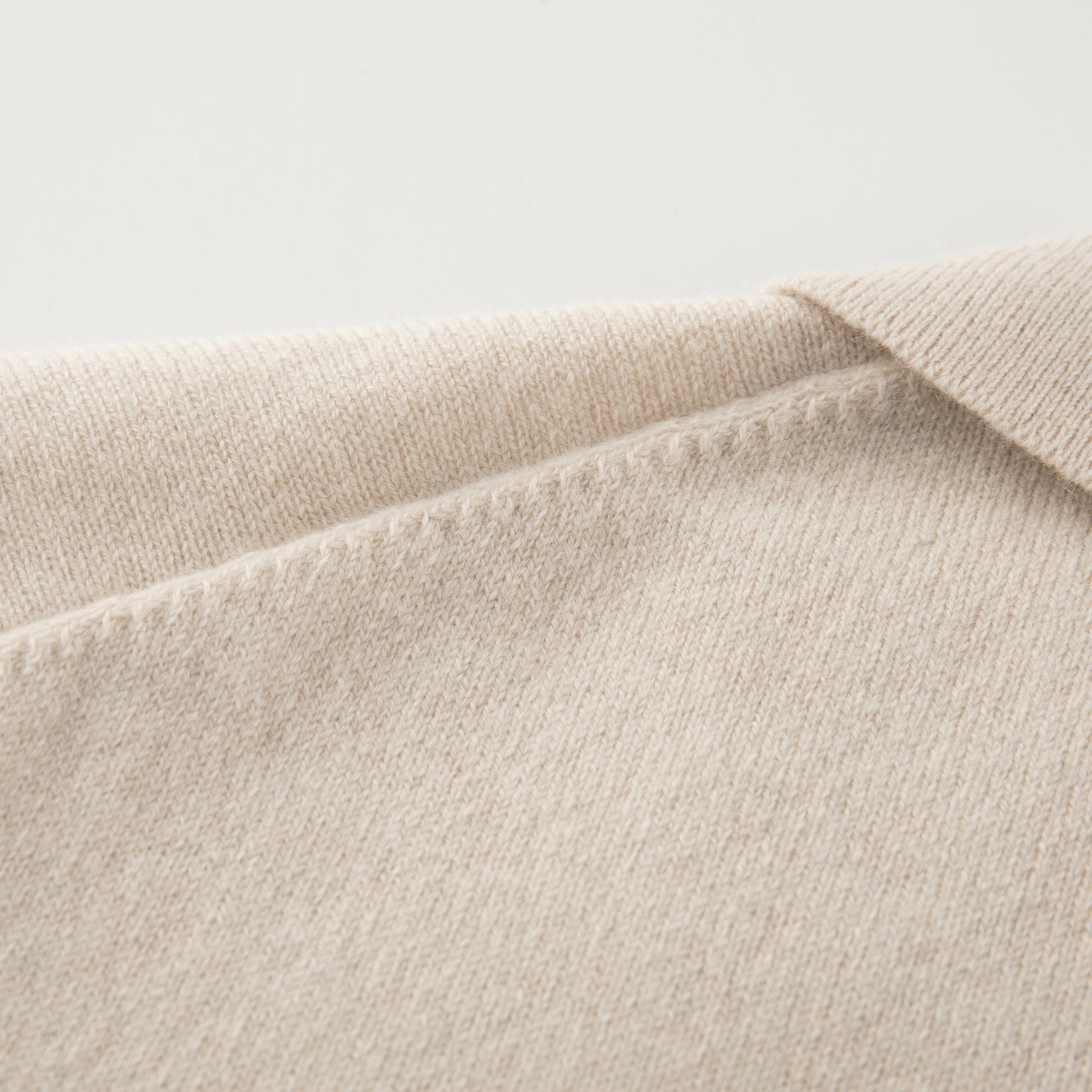 MA09 Cashmere Short Sleeve Polo Sweater by Mawei, off white, shoulder knitting details,  back view.