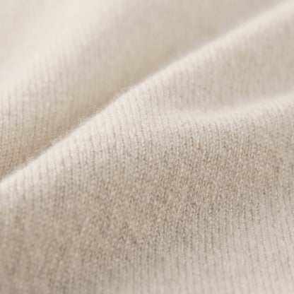 MA09 Cashmere Short Sleeve Polo Sweater by Mawei, off white, fabric texture close up.