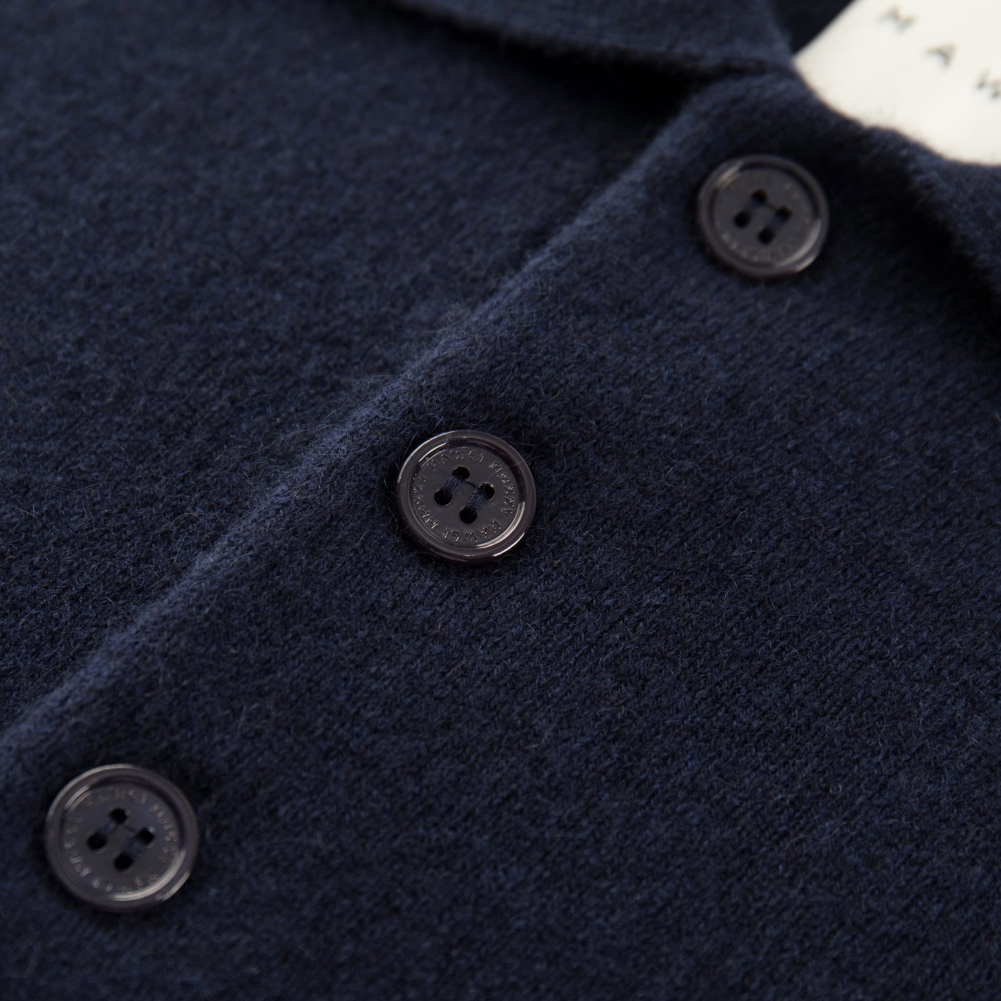 MA09 Cashmere Short Sleeve Polo Sweater by Mawei, navy blue, buttons close up