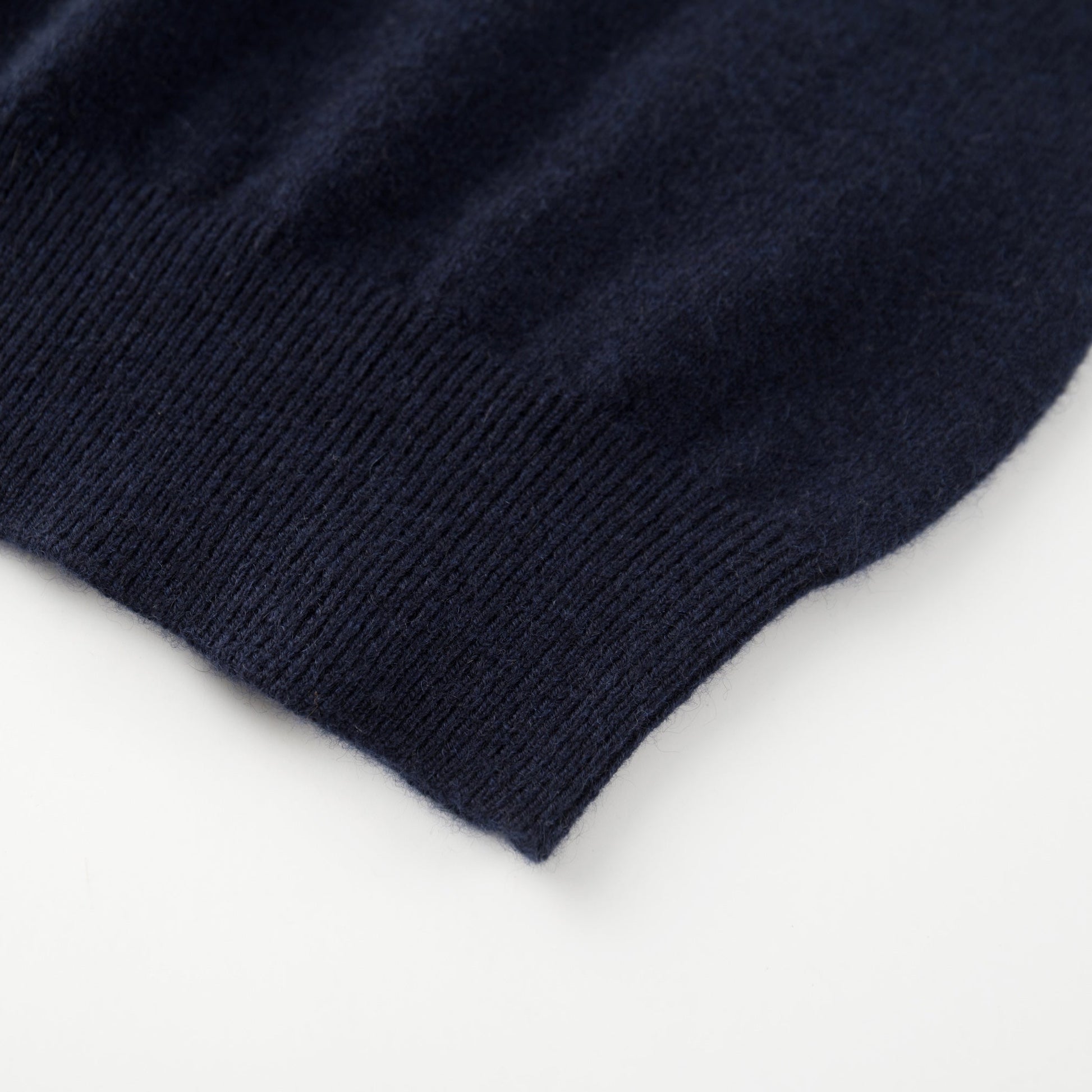MA05 Cashmere Polo Sweater by Mawei, Navy blue, hem rib detail close-up.