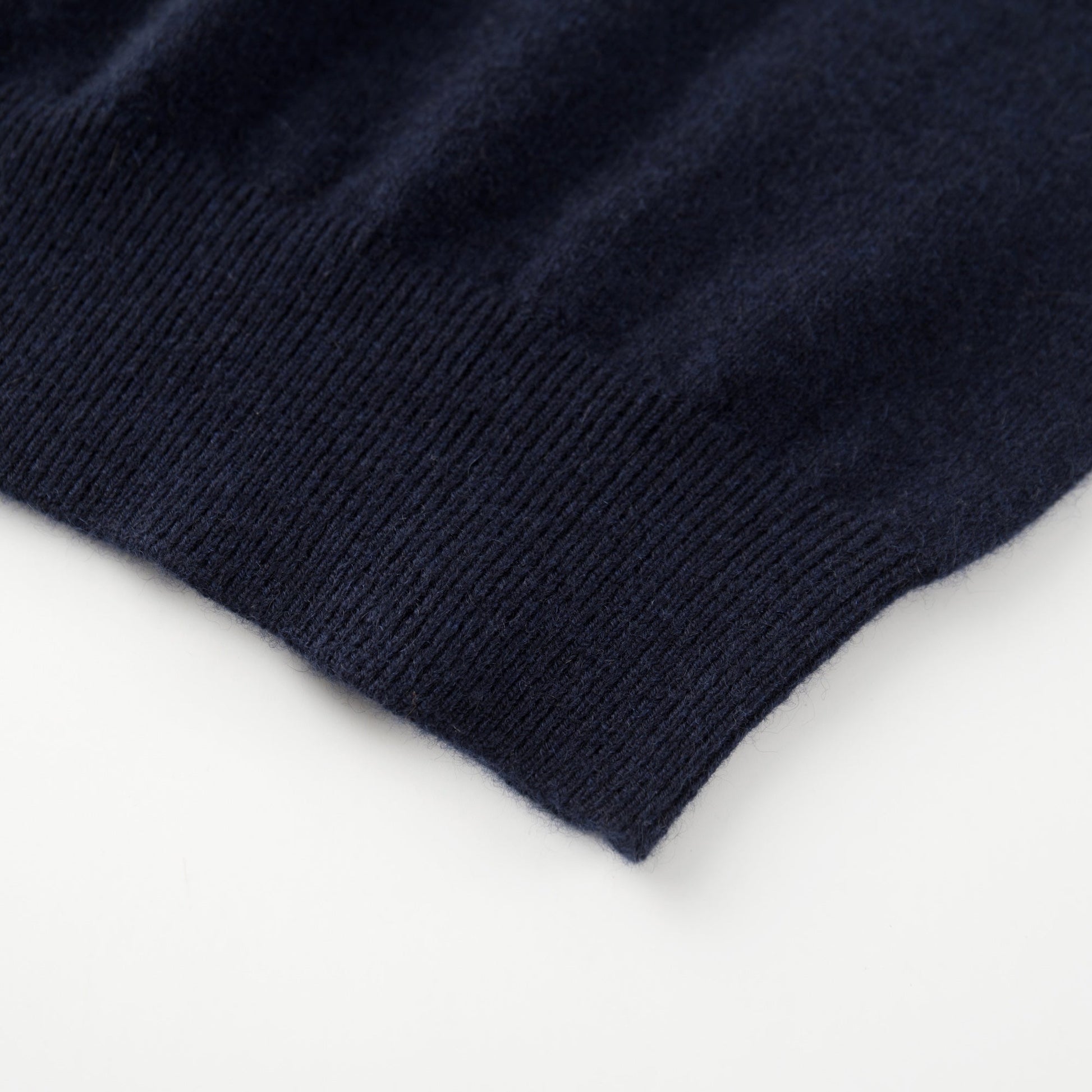 MA09 Cashmere Short Sleeve Polo Sweater by Mawei, red, hem rib close up.