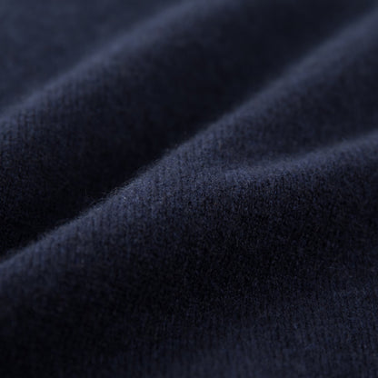 MA09 Cashmere Short Sleeve Polo Sweater by Mawei, navy blue, fabric texture close up.