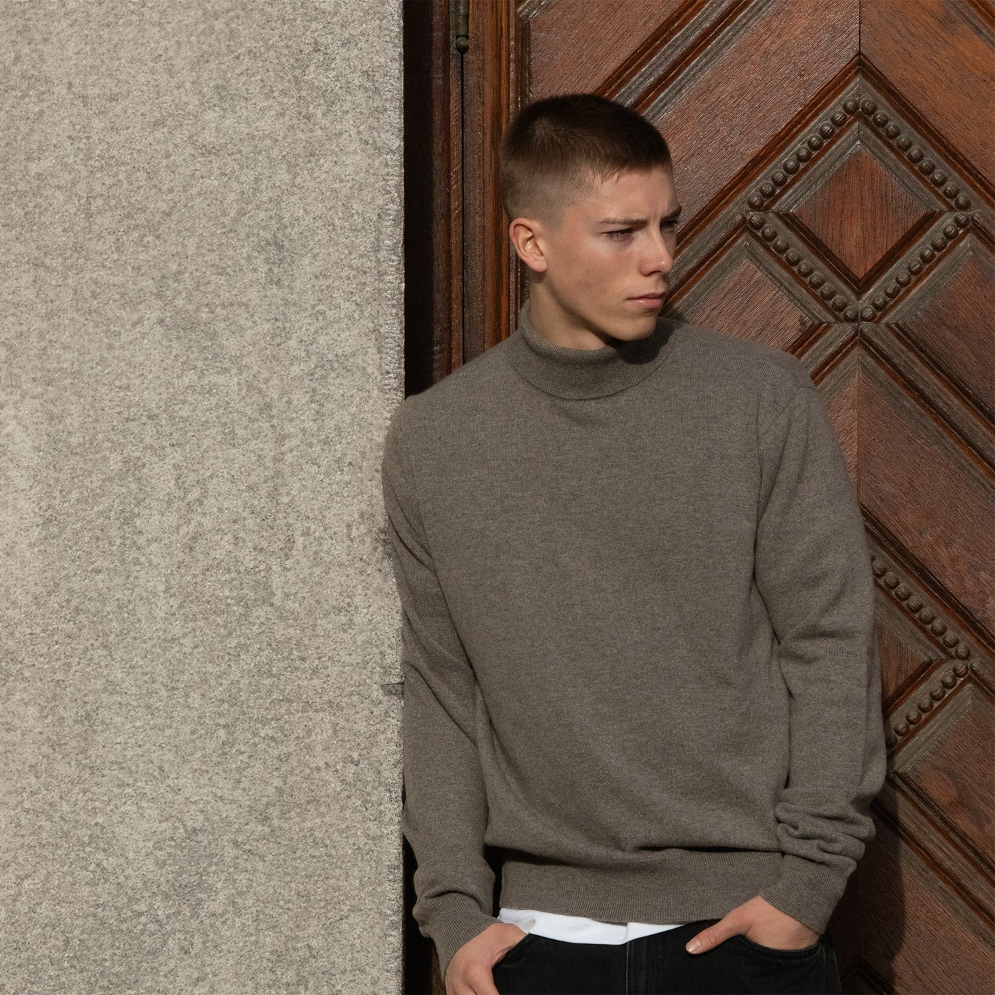 MA21 Cashmere Turtleneck Sweater by Mawei, grey-brown, front view, male model.