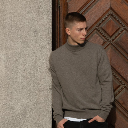 MA21 Cashmere Turtleneck Sweater by Mawei, grey-brown, front view, male model.