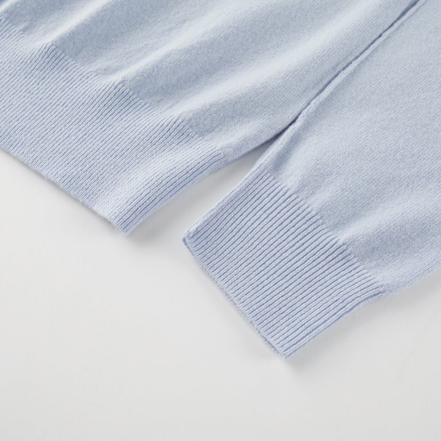 MA22 Cashmere Crewneck Sweater by Mawei, blue, cuff and hem rib details close-up.