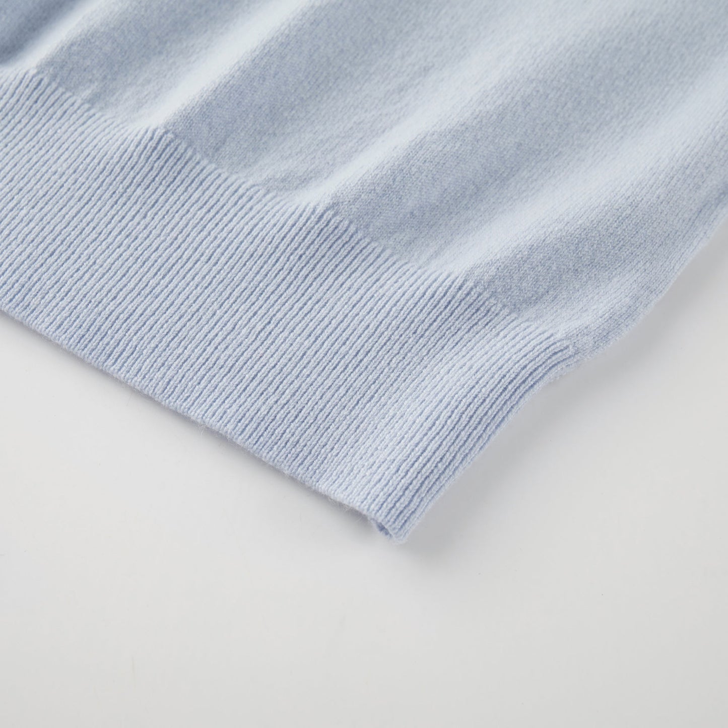 MA22 Cashmere Crewneck Sweater by Mawei, blue, hem rib detail close-up.