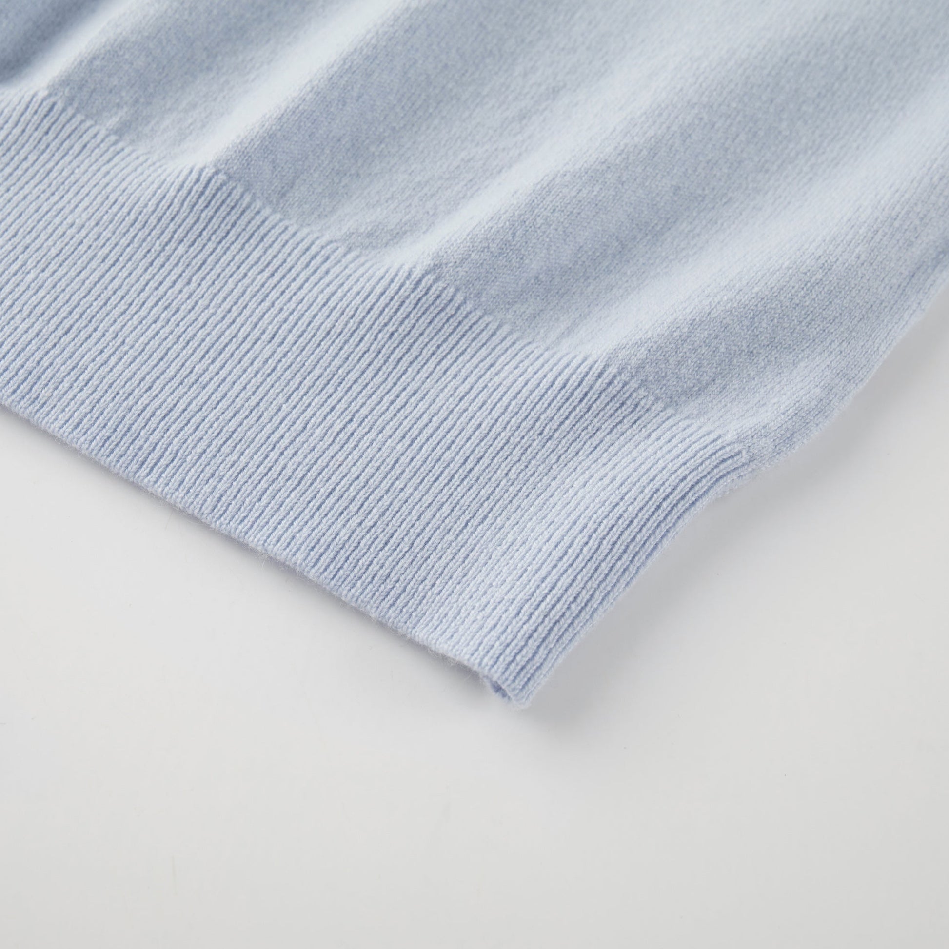 MA22 Cashmere Crewneck Sweater by Mawei, blue, hem rib detail close-up.