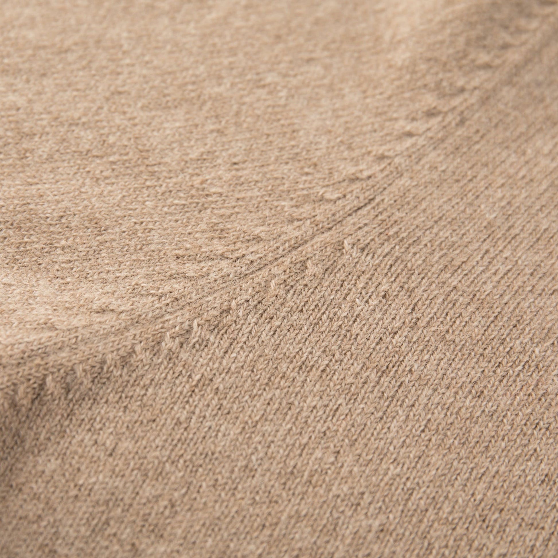 MA22 Cashmere Crewneck Sweater by Mawei, beige camel, fabric texture and details close-up.
