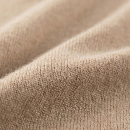 MA22 Cashmere Crewneck Sweater by Mawei, beige camel, fabric texture close-up.
