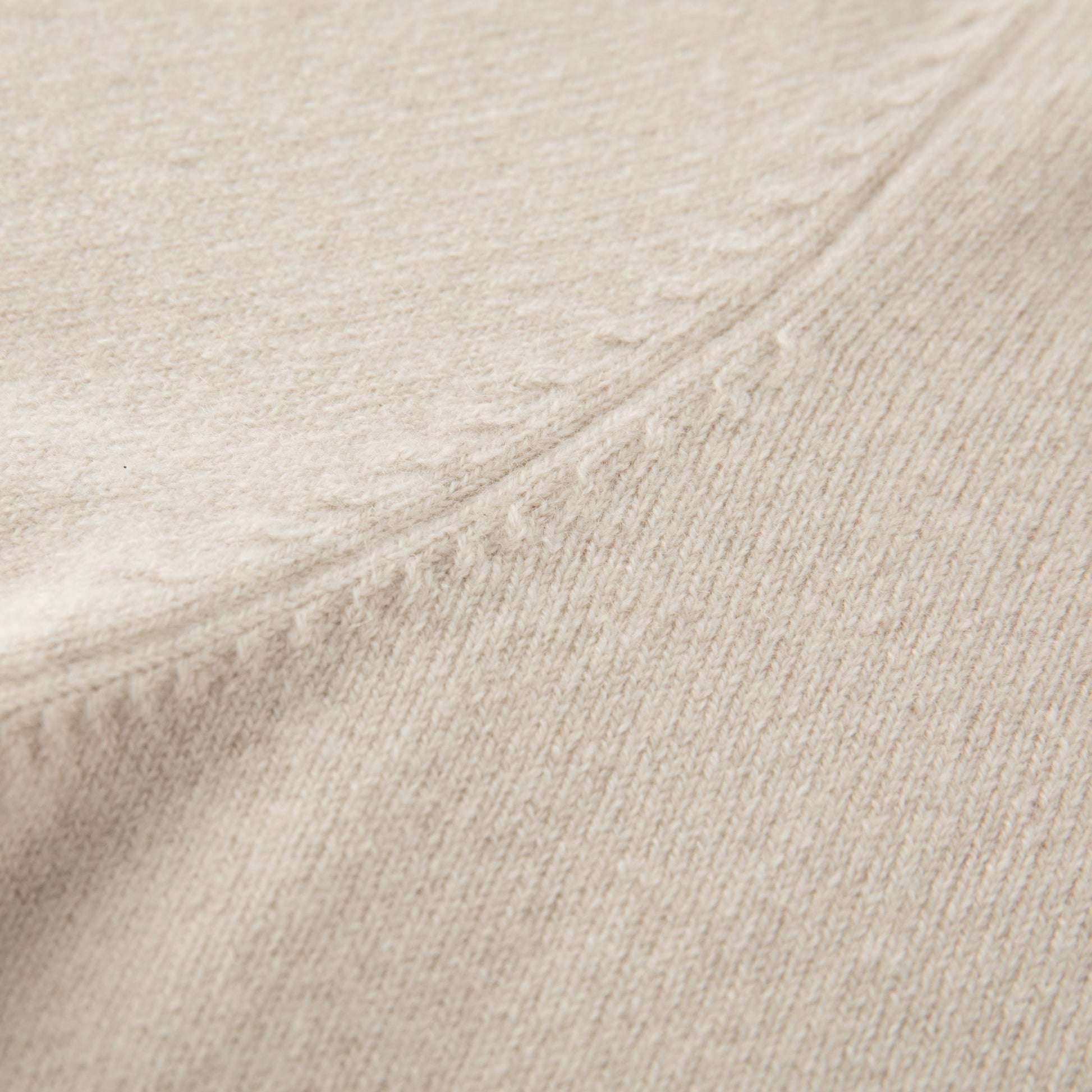 MA22 Cashmere Crewneck Sweater by Mawei, off white, knitting detail close-up.