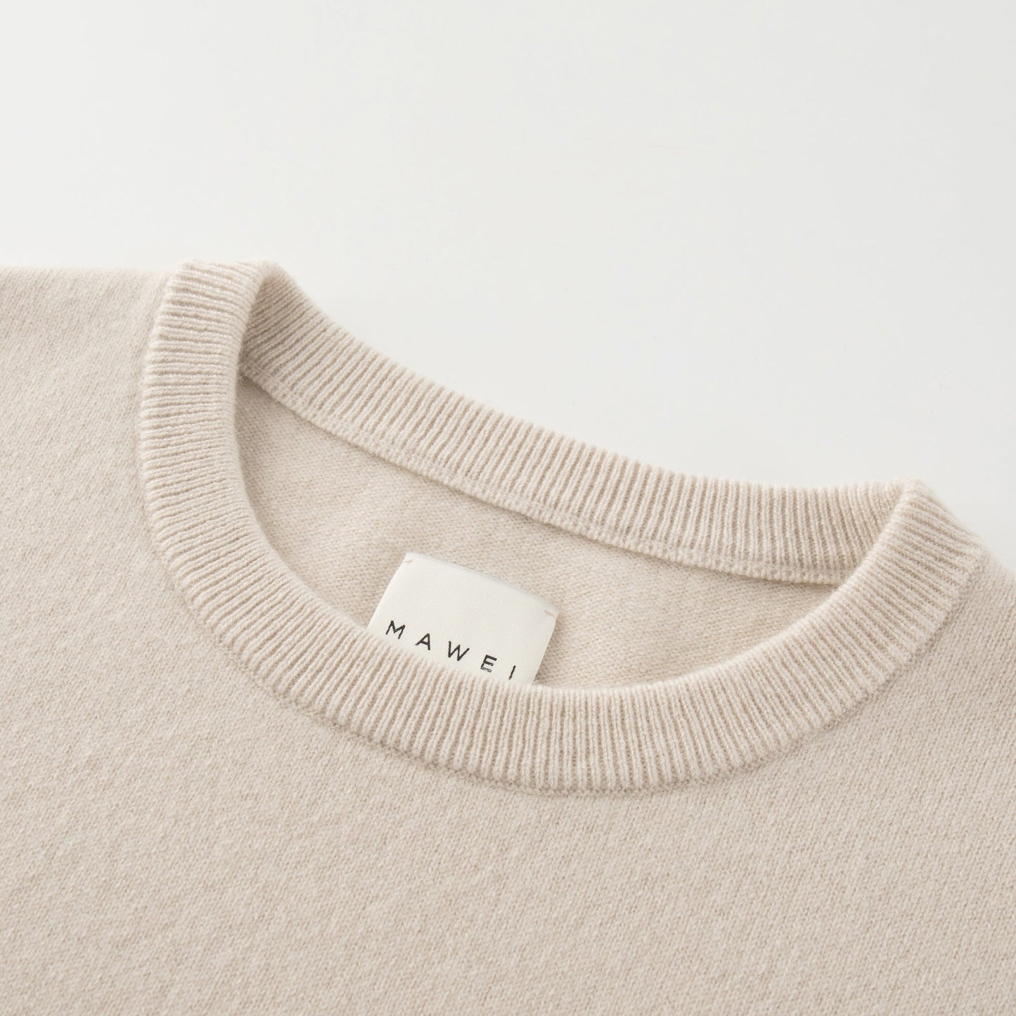 MA22 Cashmere Crewneck Sweater by Mawei, off white, neck detail close-up.