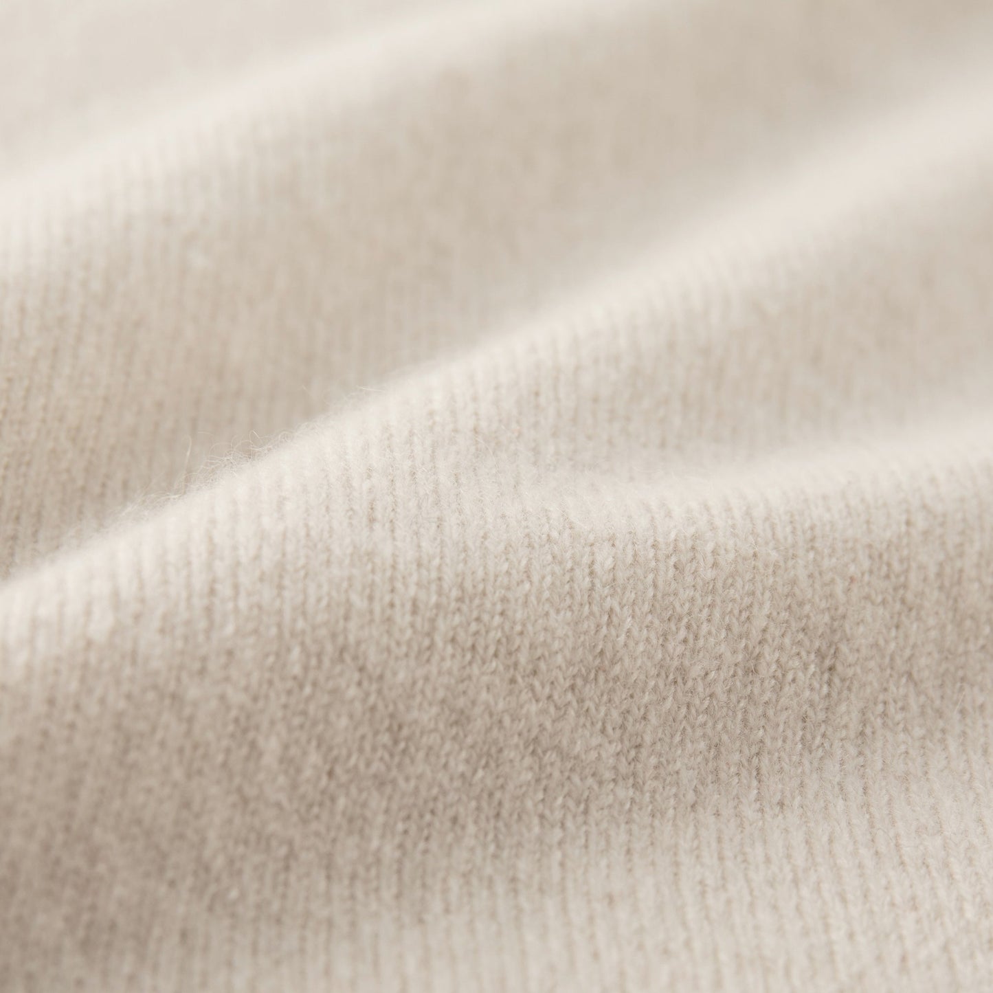 MA22 Cashmere Crewneck Sweater by Mawei, off white, fabric texture close-up.