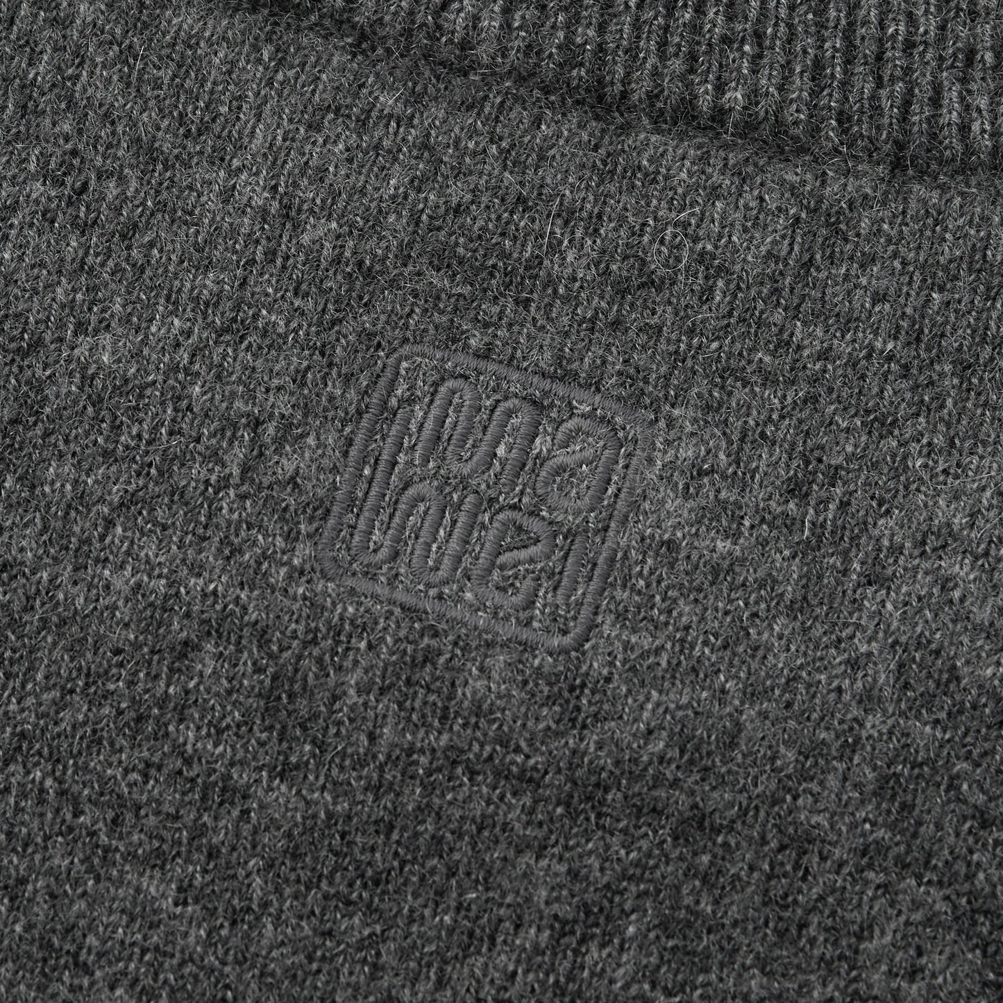 MA22 Cashmere Crewneck Sweater by Mawei, grey, fabric and embroidery detail close-up, back view.