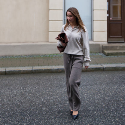 MA44 Cashmere Trousers, grey brown, and MA25 Cashmere Polo Sweater, off white, by Mawei,  front view, female model.