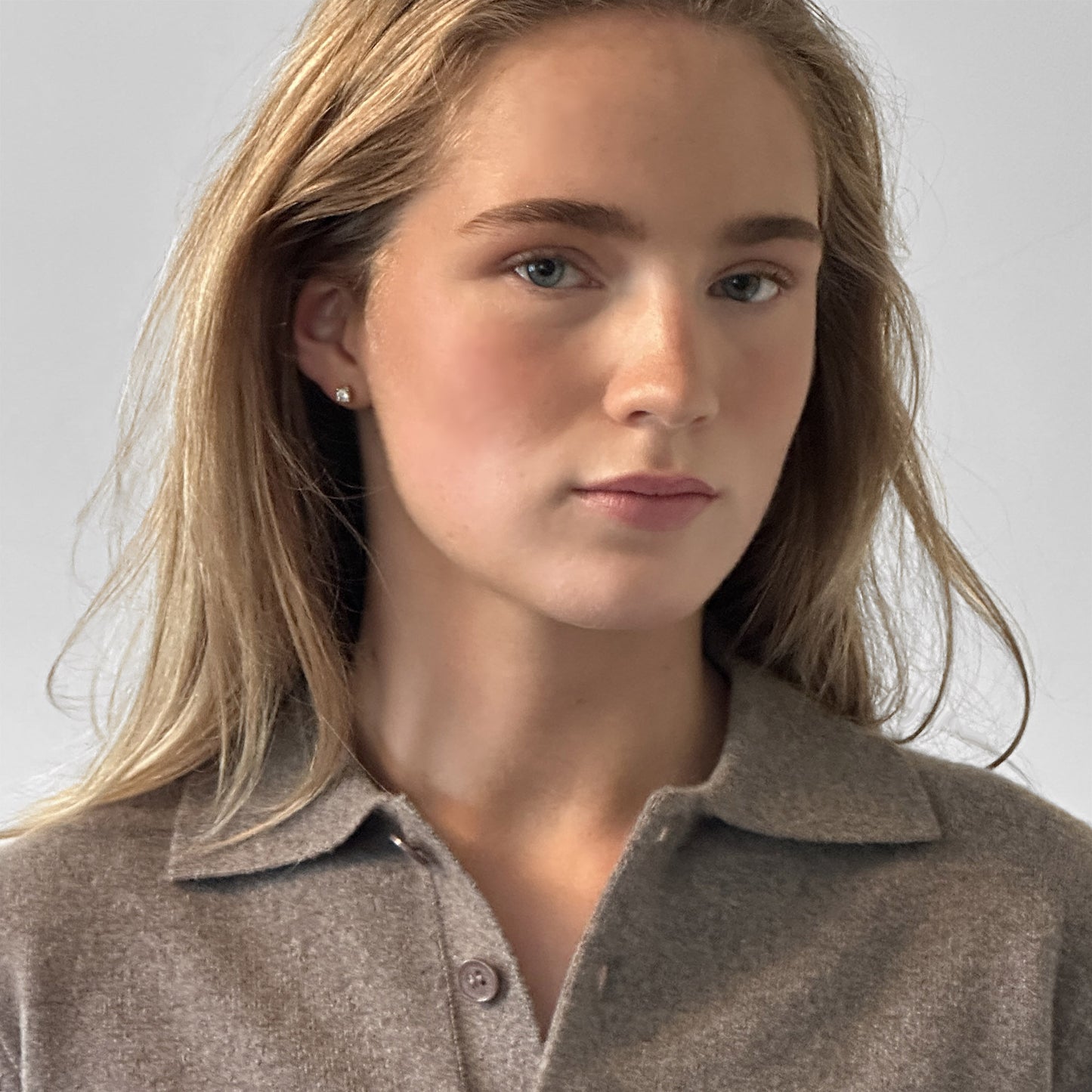 MA25 Cashmere Polo Sweater by Mawei, grey-brown, front view, female model.