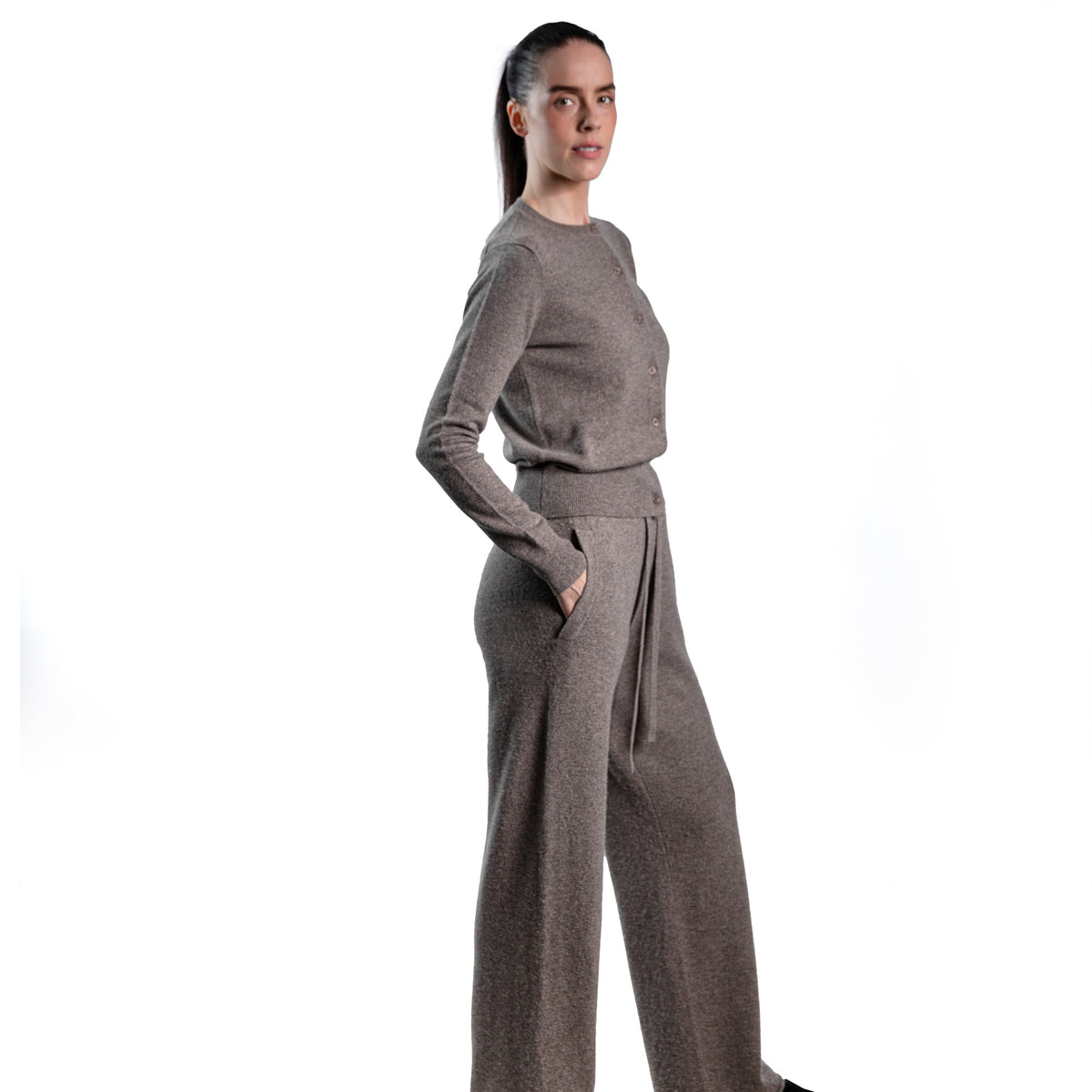 MA44 Cashmere Trousers with pockets by Mawei, brown grey, side view, female model.