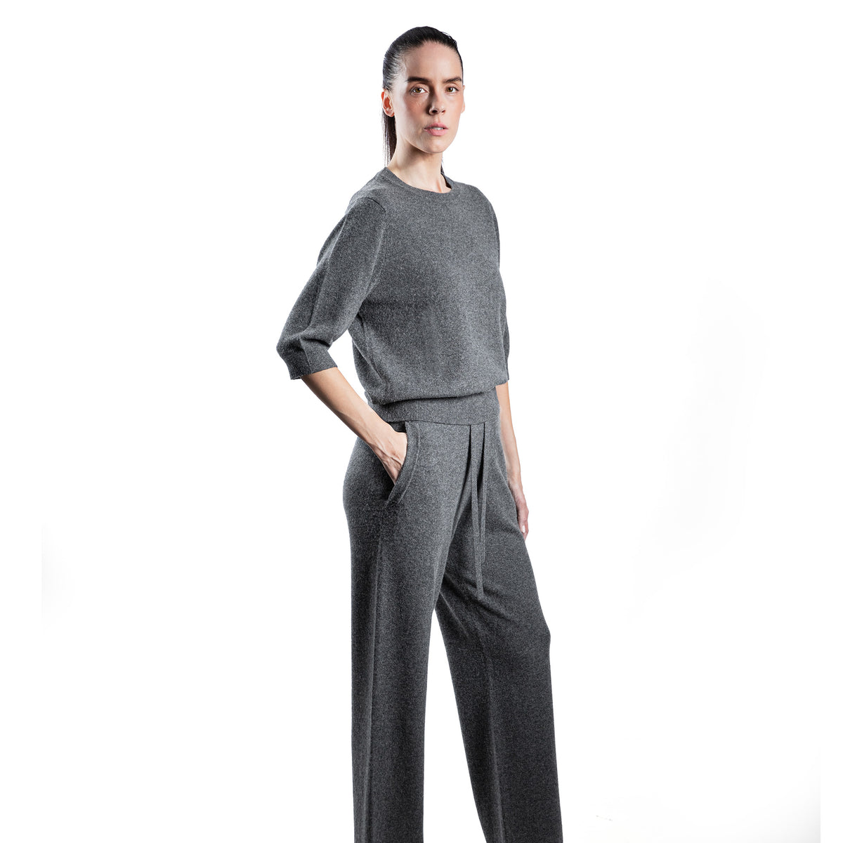 MA44 Cashmere Trousers with pockets by Mawei, grey, side view, female model.