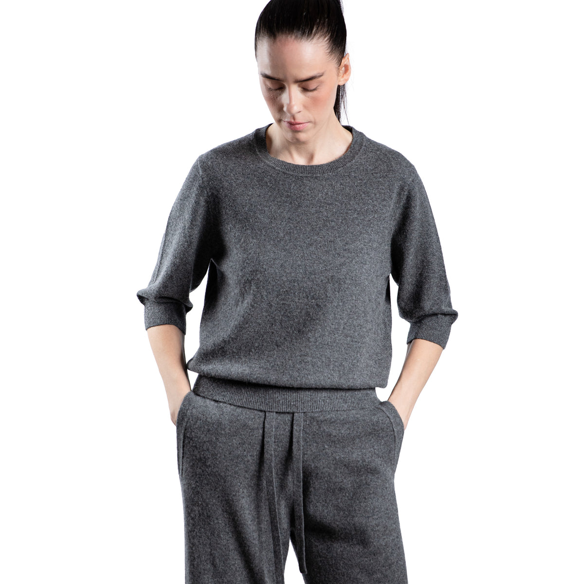 MA44 Cashmere Trousers with pockets by Mawei, grey, close up front view, female model.