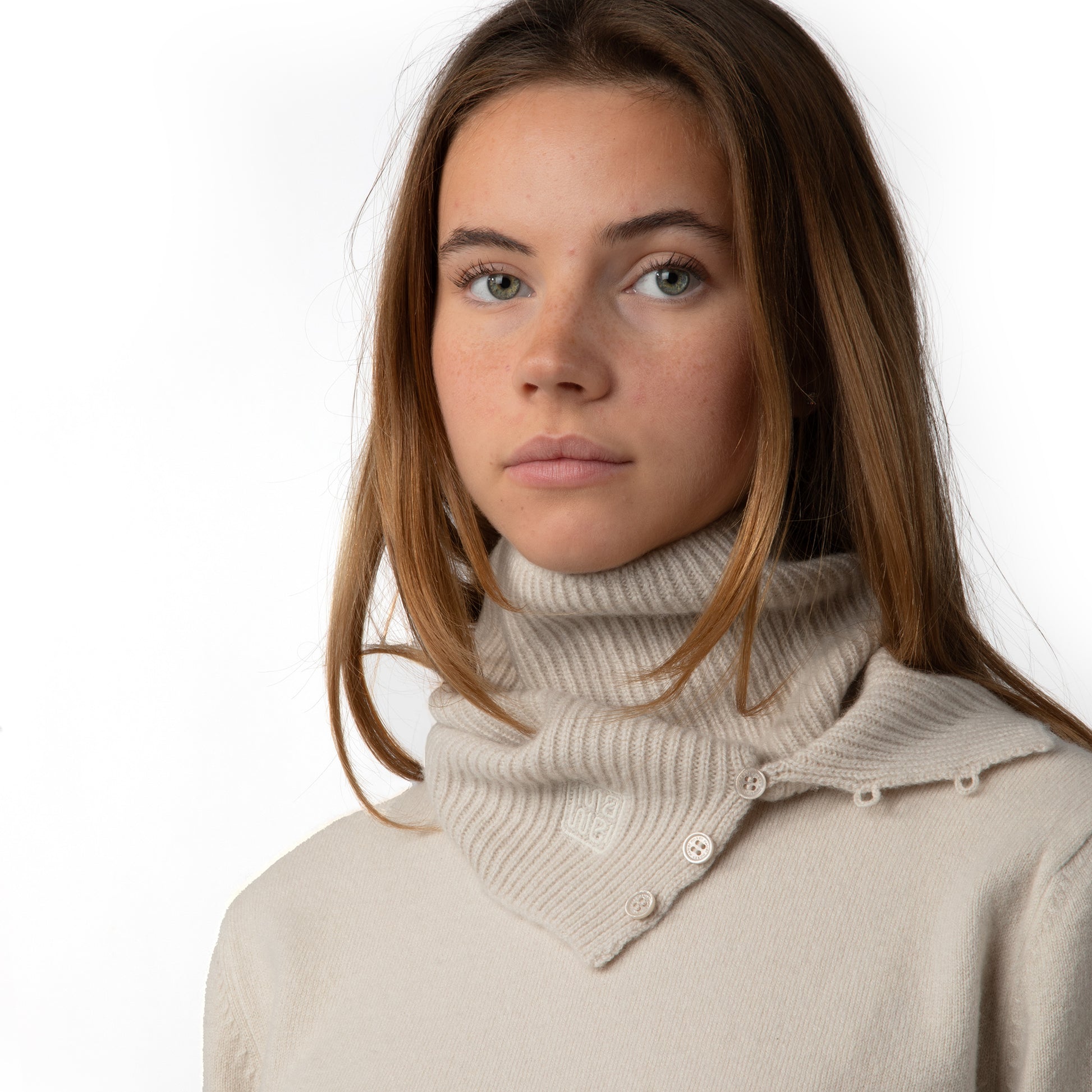 MA61 Cashmere Buff with Buttons by Mawei, off white, front view, female model.