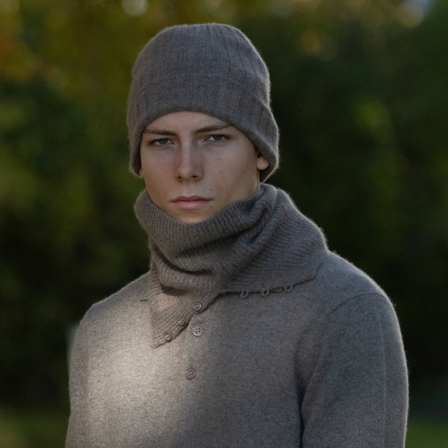 MA71 Cashmere Beanie by Mawei, grey-brown, MA61 Cashmere Buff, front view, male model.