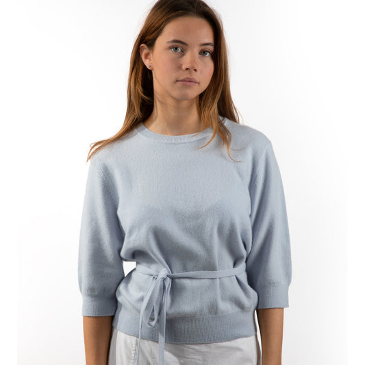 MA03 Cashmere Short Sleeve Crewneck Sweater by Mawei,  blue, with MA91 Cashmere ribbon, blue  front view, female model.